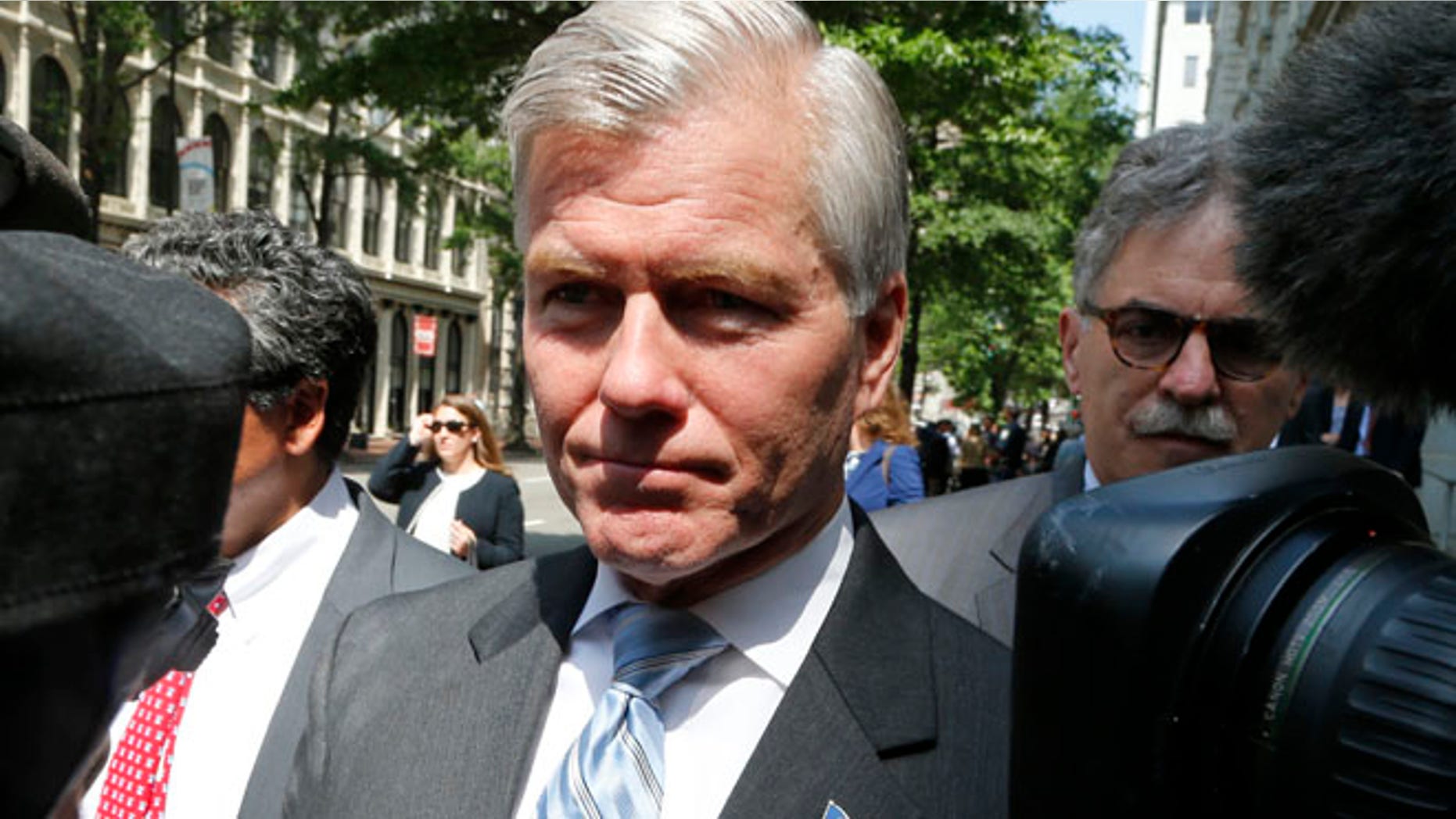 May 12, 2015: Former Virginia Gov. Bob McDonnell navigates a group of cameras as he leaves the 4th U.S. Circuit Court of Appeals after a hearing the appeal of his corruption conviction in Richmond, Va. (AP)
