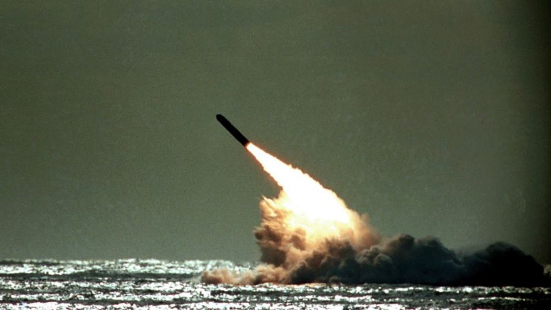 FILE 1989: A Trident II missile launched by the U.S. Navy during a performance evaluation from the submerged submarine USS Tennessee in the Atlantic Ocean off the coast of Cape Canaveral in Titusville, Fla., USA