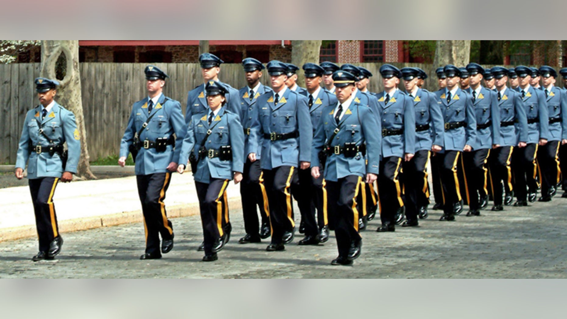 A new lawsuit alleges the State Police was pressured into accepting more racially diverse candidates for the police academy.