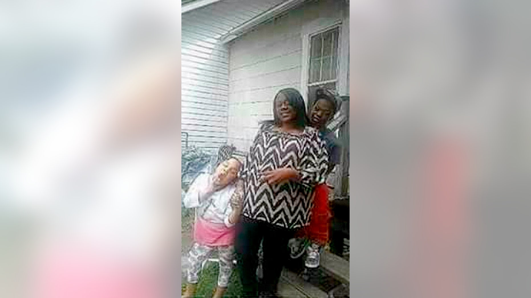 Two suspects have been charged in connection to the quadruple homicide of a mother, her two children and her lover.