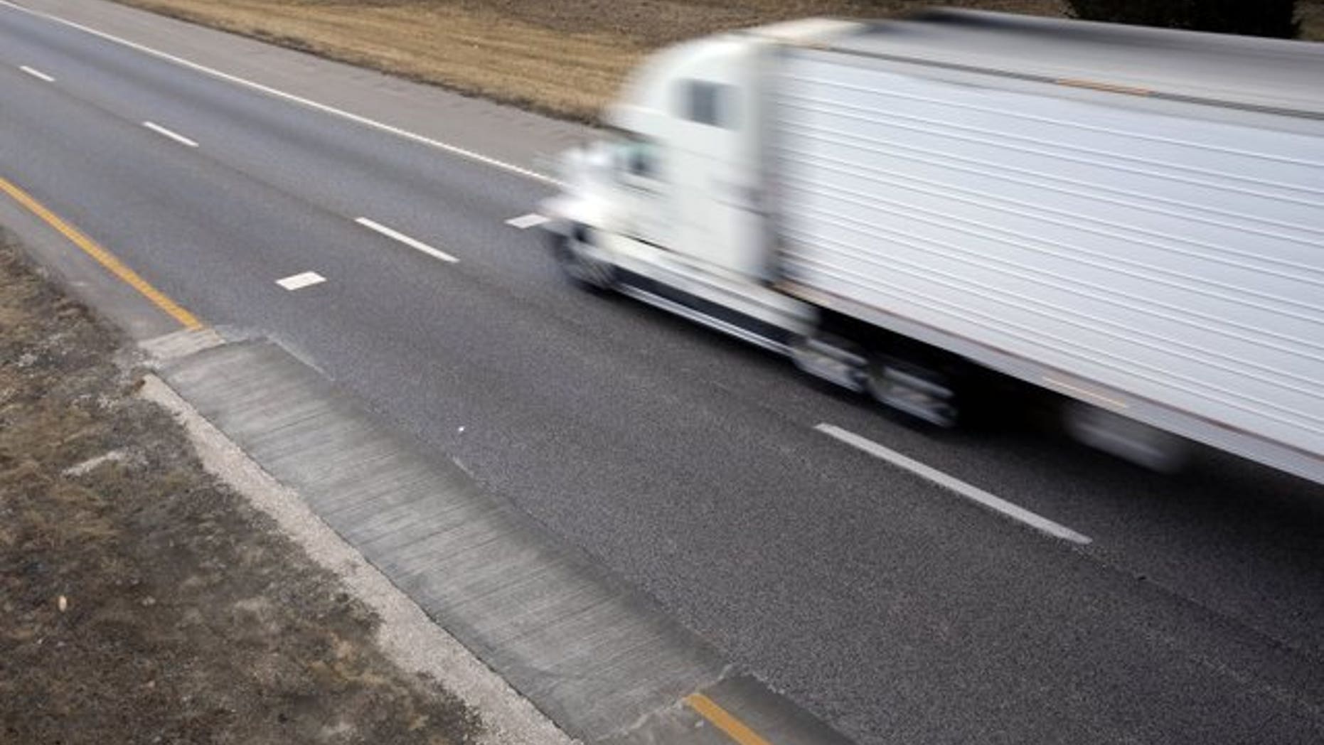 A jury awarded $240,000 to Muslim drivers who say a trucking company fired them. (AP Photo/Jeff Roberson)