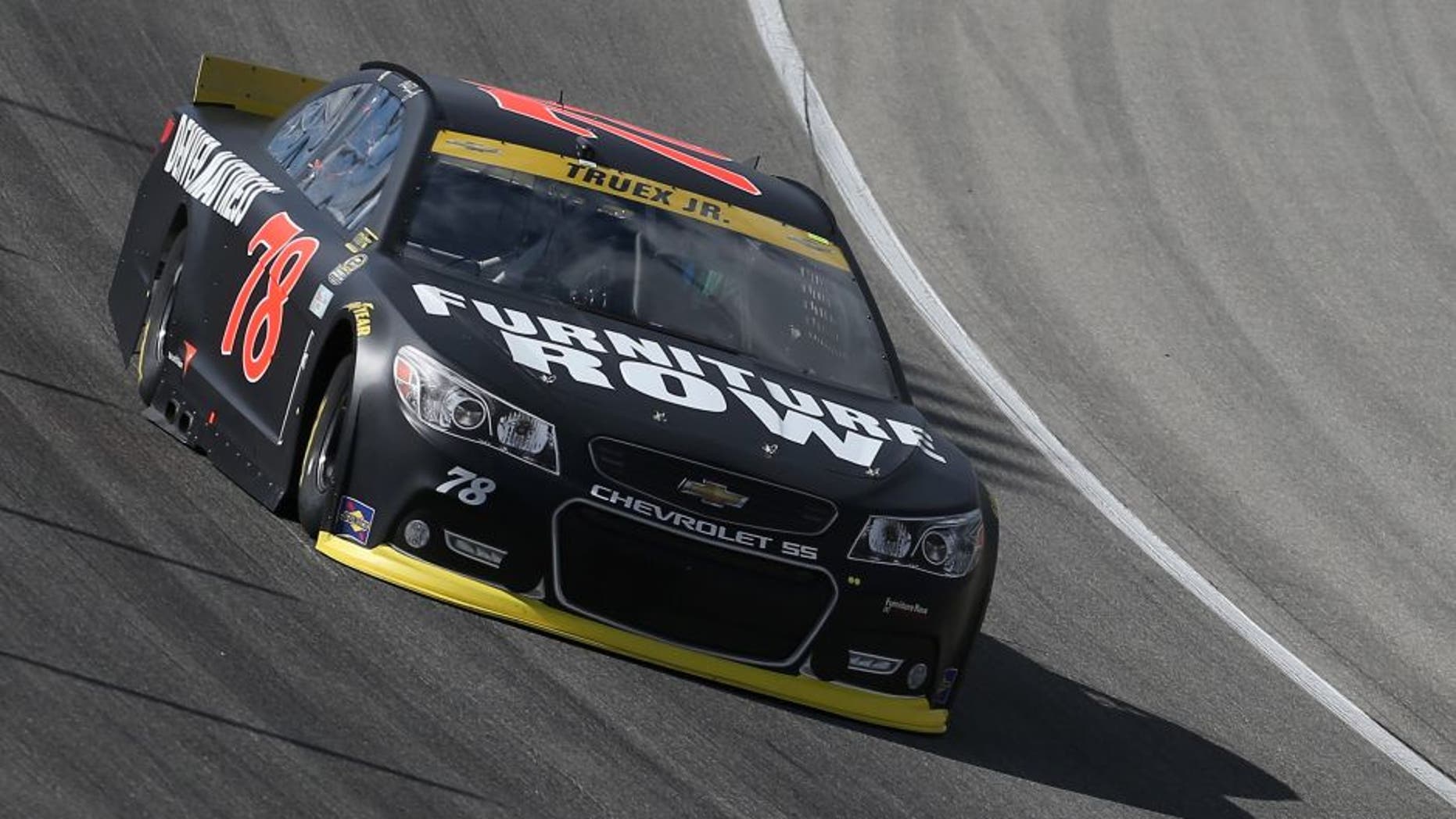 JOLIET, IL - SEPTEMBER 19: Martin Truex Jr, driver of the #78 Furniture Row/Visser Precision Chevrolet, practices for the NASCAR Sprint Cup Series MyAFibRisk.com 400 at Chicagoland Speedway on September 19, 2015 in Joliet, Illinois. (Photo by Matt Sullivan/Getty Images)