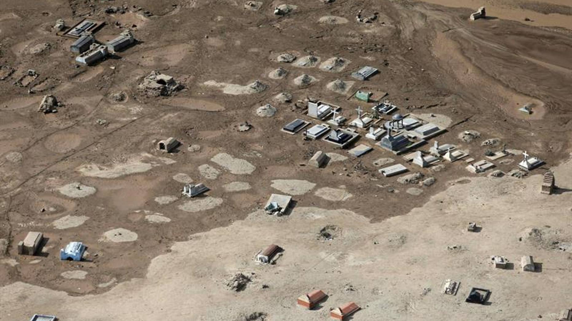 Aerial photograph shows a flooded cemetery in Trujillo, Peru.