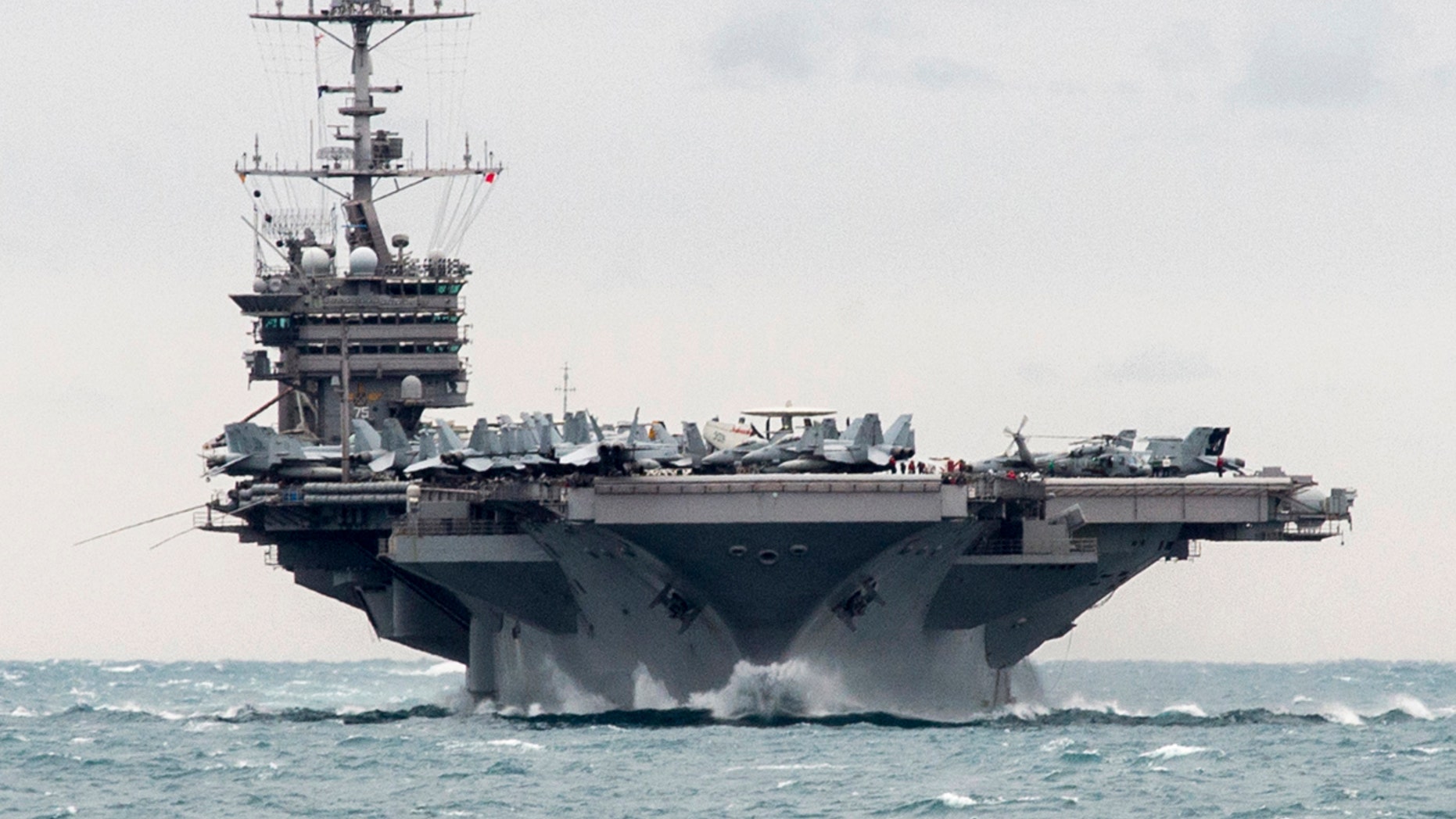 FILE: 2015: Aircraft carrier USS Harry S. Truman in the Strait of Hormuz. (U.S. Navy via AP)