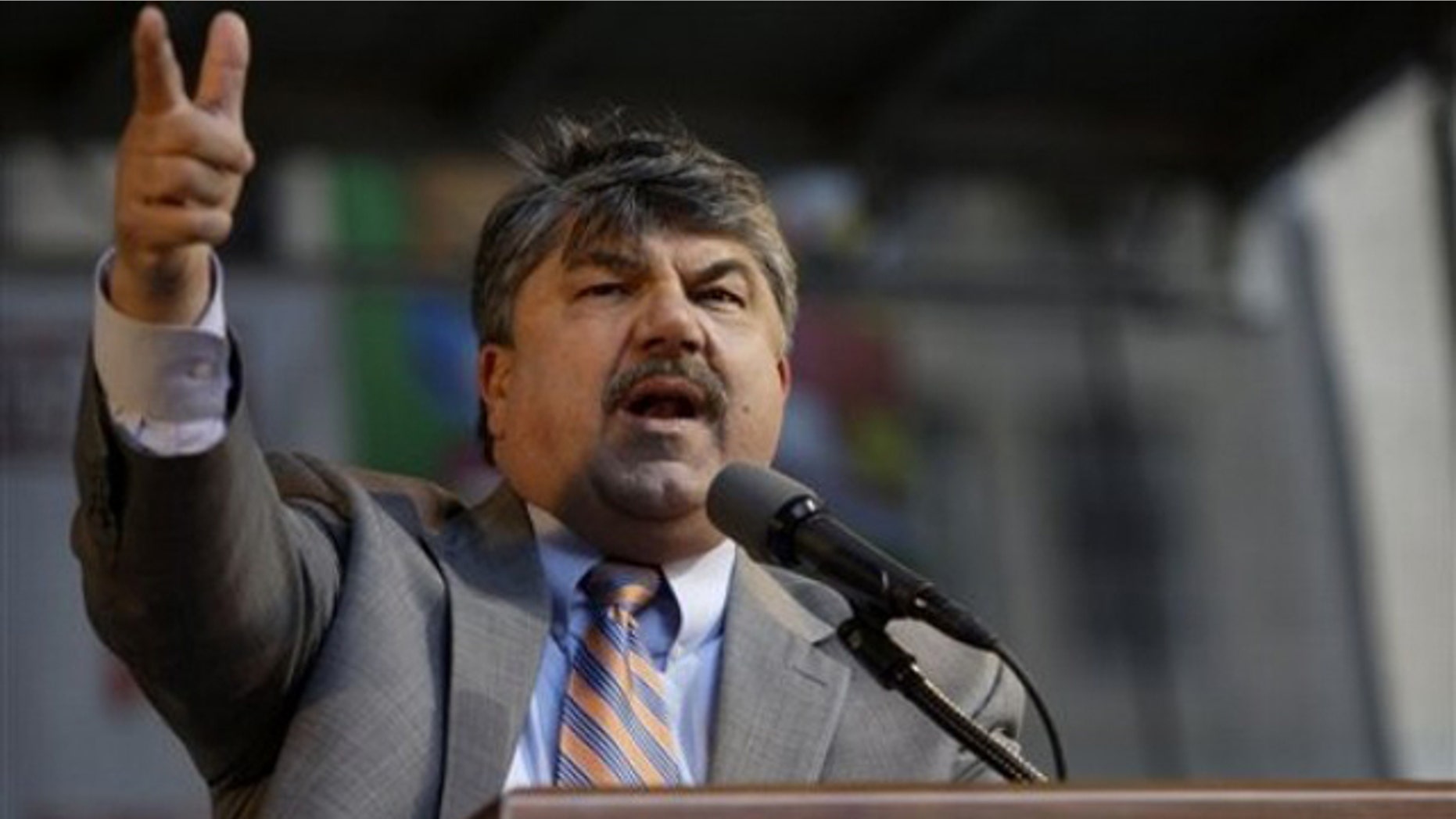 AFL-CIO President Richard Trumka gestures while speaking at a rally near City Hall April 29 in New York.