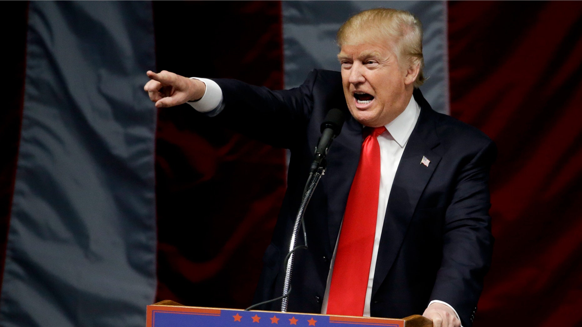 FILE - April 28, 2016: Republican presidential candidate Donald Trump speaks during a rally in Costa Mesa, Calif.
