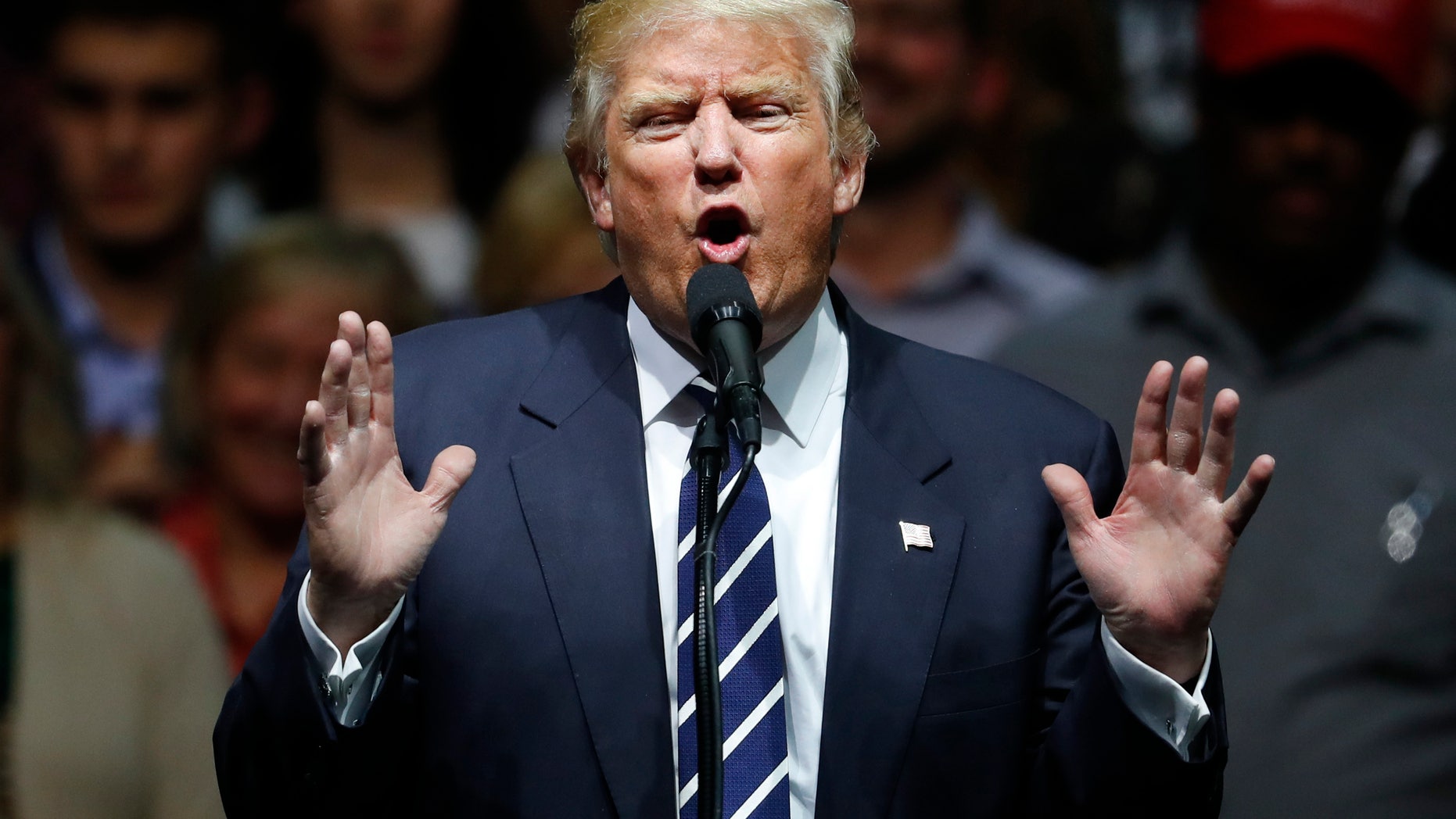 In this Dec. 9, 2016, photo, President-elect Donald Trump speaks to supporters during a rally, in Grand Rapids, Mich. In claiming that he scored âa massive landslide victoryâ in last monthâs presidential election, Trump turned history upside down. In fact, his winning margin in the Electoral College is on the other end of the historical spectrum, far closer to the narrowest win in history than to the widest. (AP Photo/Paul Sancya)