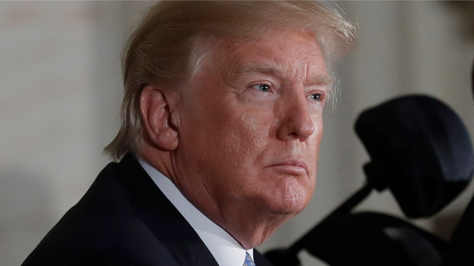 U.S. President Donald Trump attends a Congressional Gold Medal ceremony honoring former Senate majority leader Bob Dole (R) at the U.S. Capitol in Washington, U.S., January 17, 2018. REUTERS/Carlos Barria - HP1EE1H1LVVNC