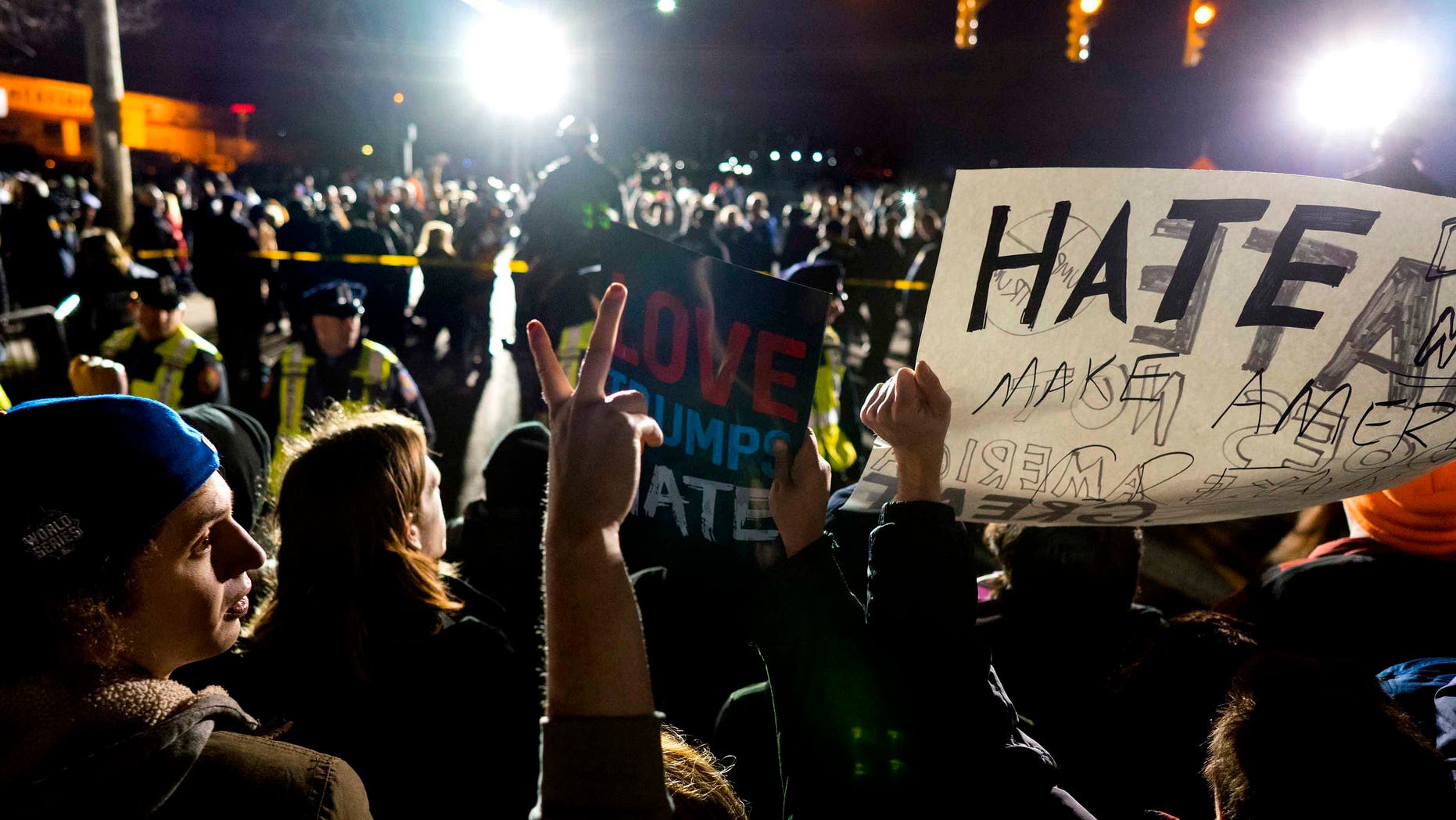 People protesting against Donald Trump in Bethpage, New York, Wednesday, April 6, 2016.