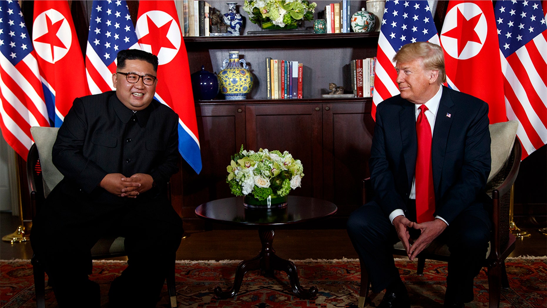 President Donald Trump meets with North Korean leader Kim Jong Un on Sentosa Island, Tuesday, June 12, 2018, in Singapore.