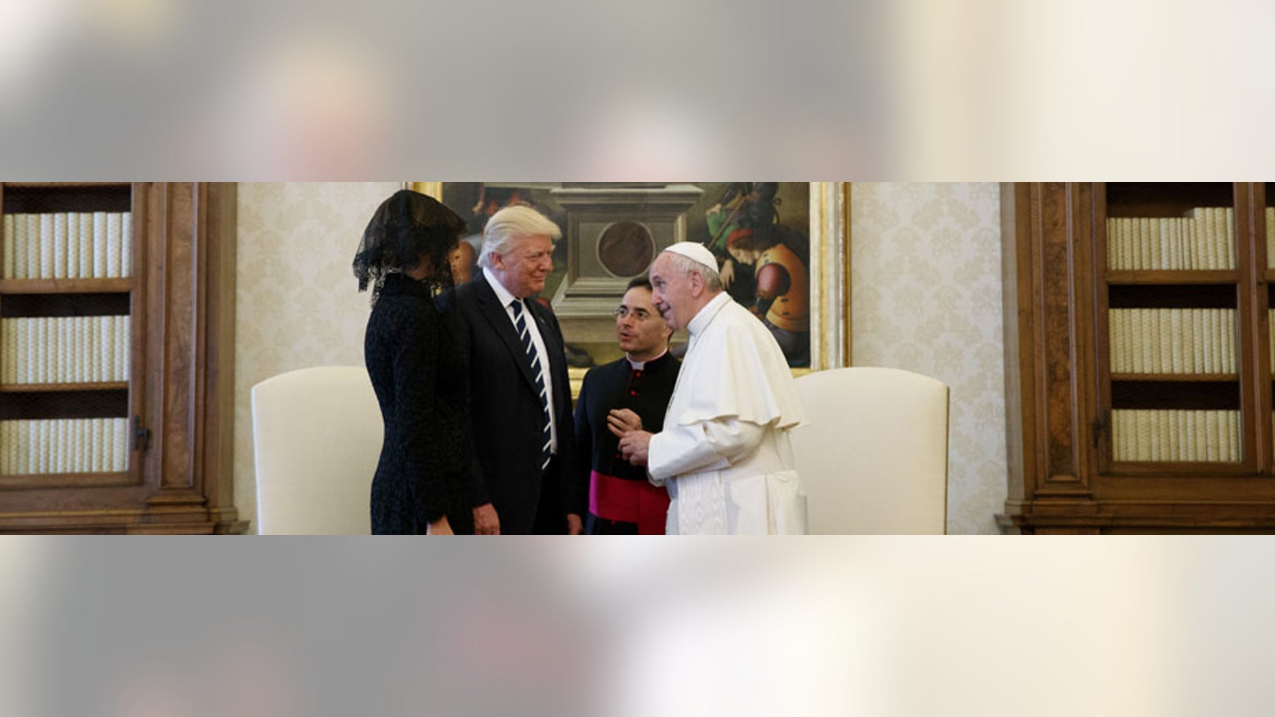 May 24, 2017: U.S. President Donald Trump and first lady Melania talk with Pope Francis during a meeting at the Vatican.