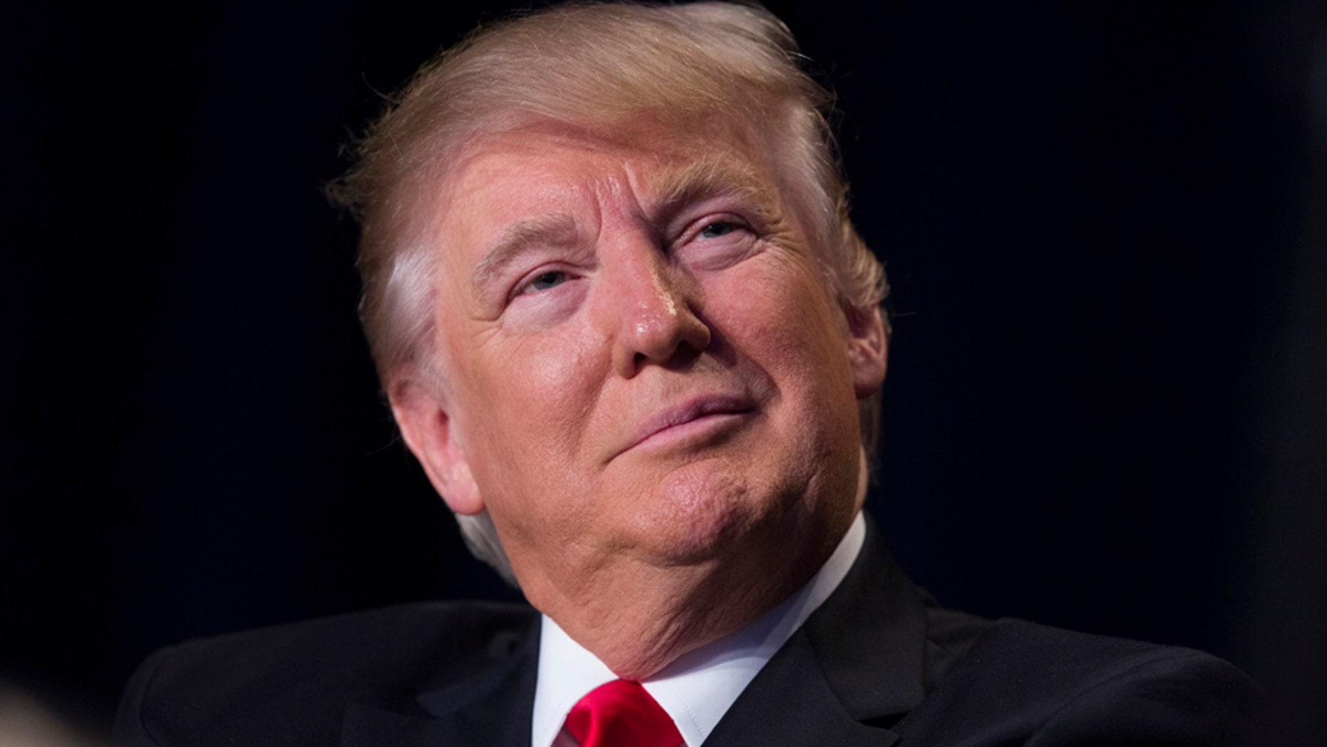 President Donald Trump listens as he is introduced during the National Prayer Breakfast, Thursday, Feb. 2, 2017, in Washington. (AP Photo/Evan Vucci)