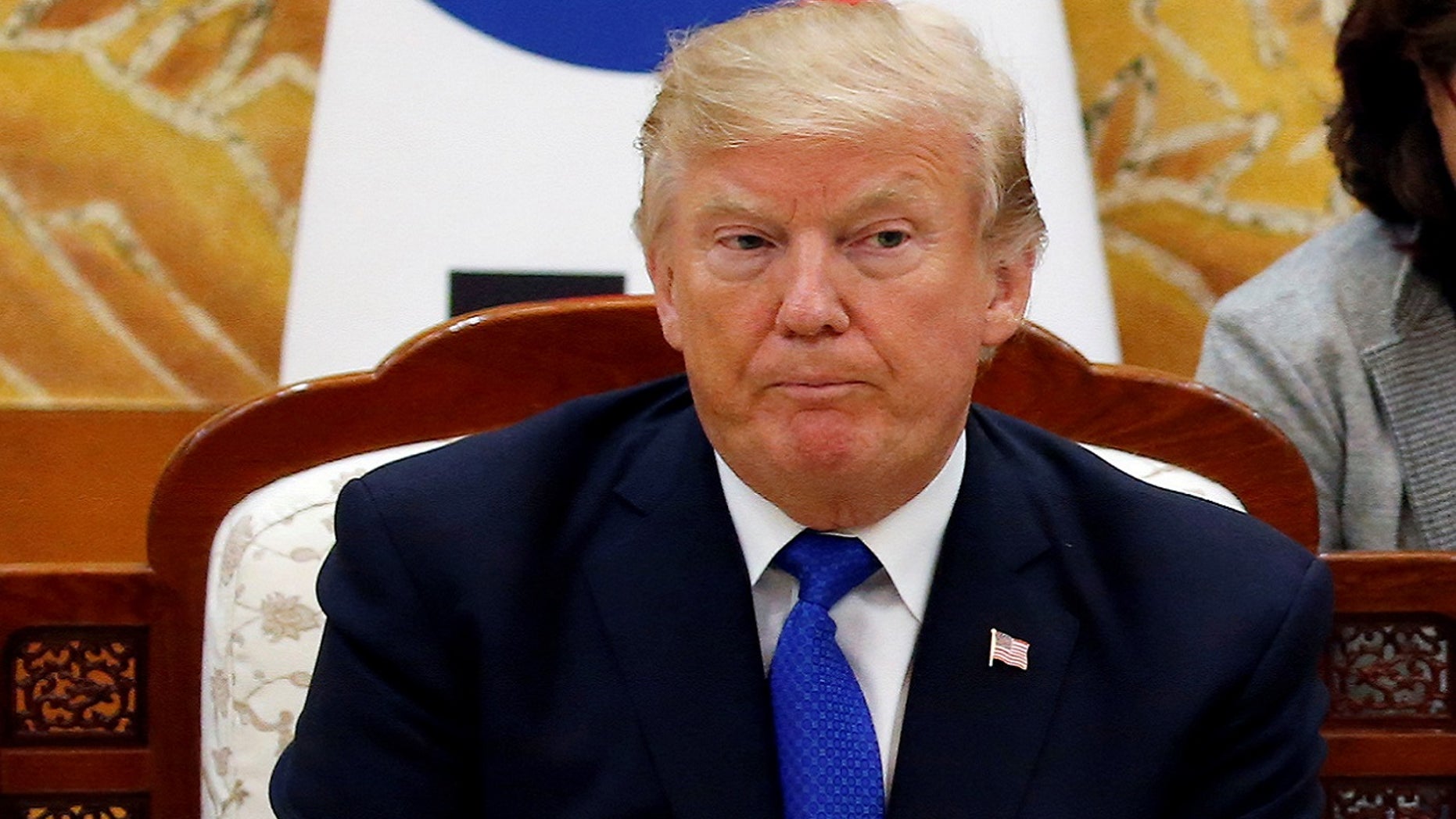 President Donald Trump and South Koreas President Moon Jae-in meet at South Koreas presidential Blue House in Seoul, South Korea, Nov. 7, 2017. In an Oval Office meeting, he asked a South Korean American expert in hostage policy where her "people" were from.