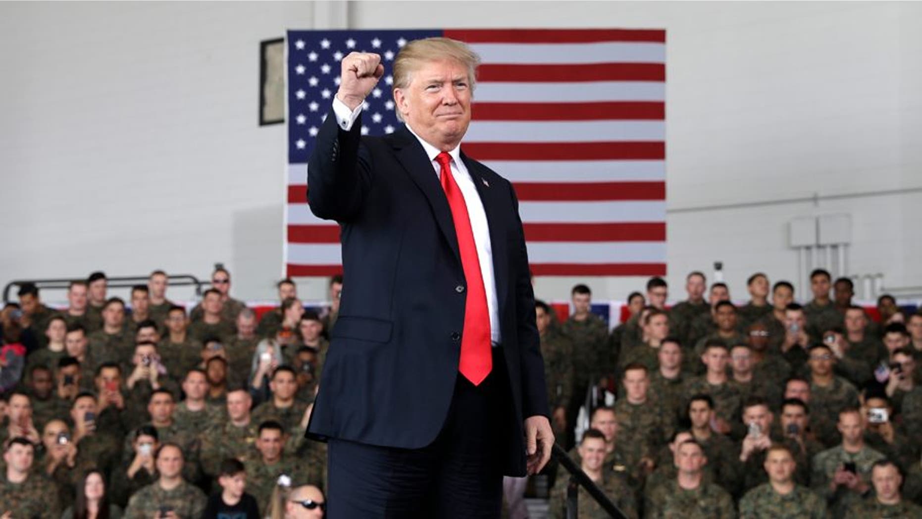 President Donald Trump arrives speaks to service members at Marine Corps Air Station Miramar, Tuesday, March 13, 2018, in San Diego. (AP Photo/Evan Vucci)