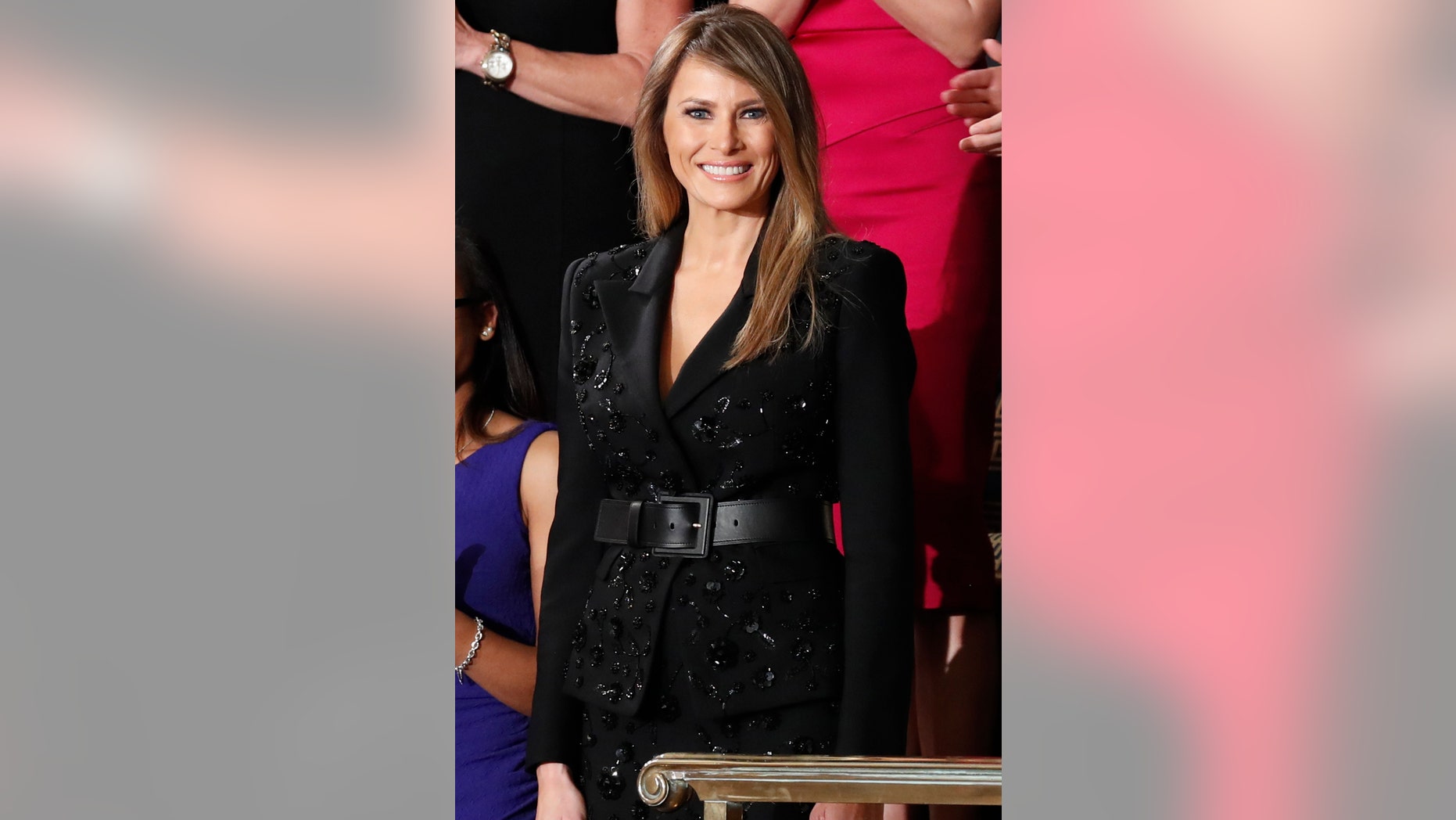 First lady Melania Trump is applauded as she arrives on Capitol Hill in Washington, Tuesday, Feb. 28, 2017, for President Donald Trump's speech to a joint session of Congress. (AP Photo/Pablo Martinez Monsivais)