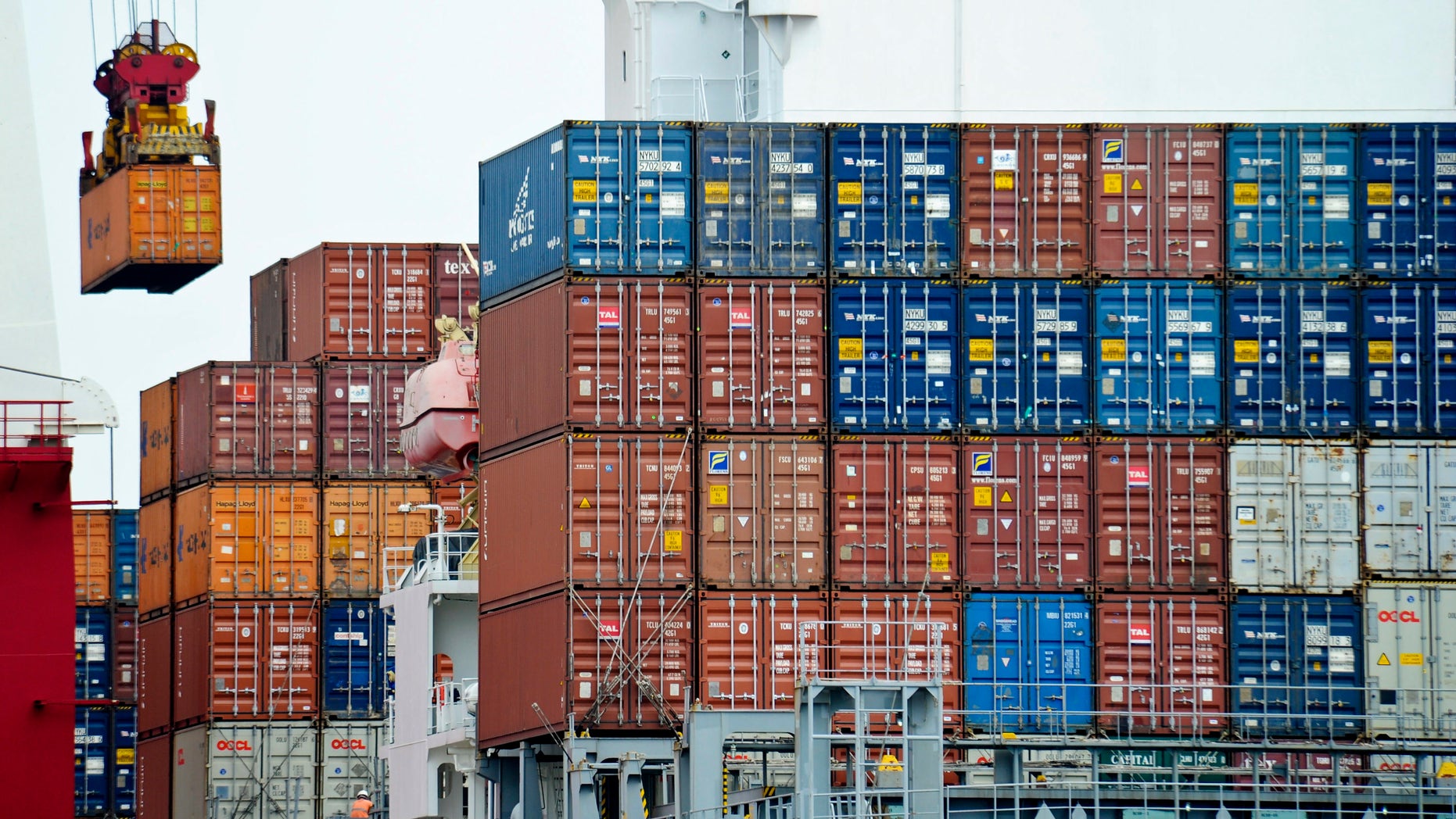 Aug. 5, 2010: A container is loaded onto a cargo ship at the Tianjin port in China.