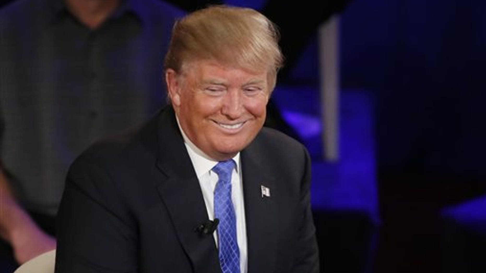 Republican presidential candidate Donald Trump smiles during a town hall in the historic Riverside Theatre on March 29, 2016, in Milwaukee. (AP Photo/Charles Rex Arbogast)