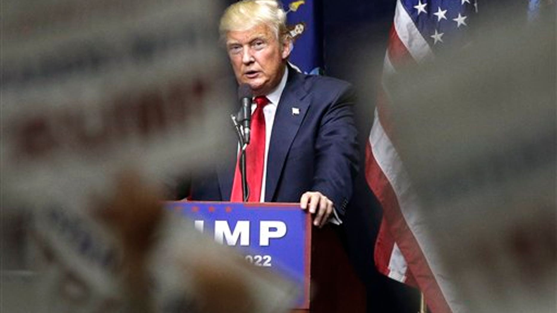 Republican presidential candidate Donald Trump speaks during a campaign rally, Wednesday, April 6, 2016, in Bethpage, N.Y. (AP Photo/Julie Jacobson)