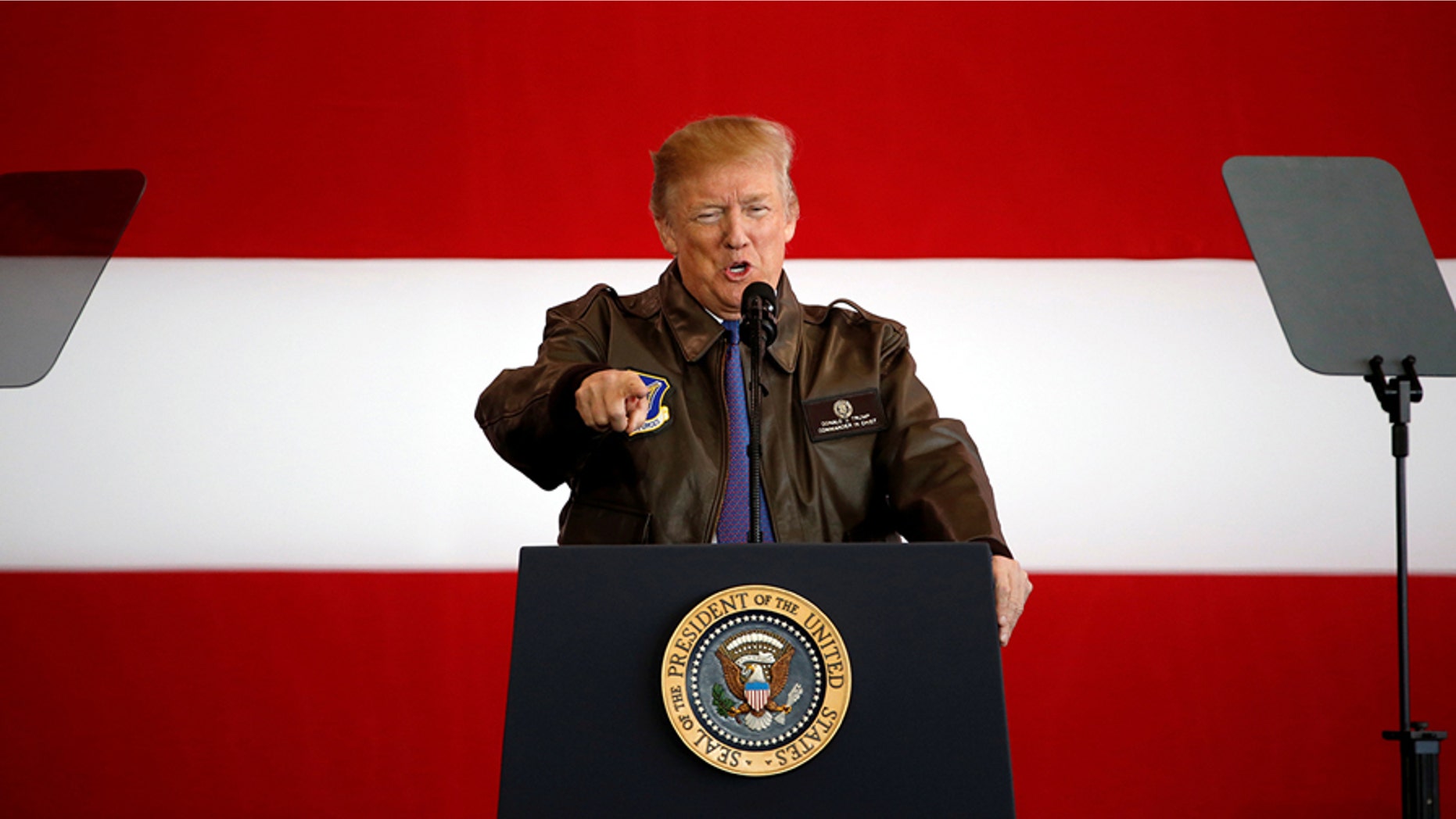 U.S. President Donald Trump addresses members of U.S. military and Japan Self-Defense Force (JSDF) at U.S. Air Force Yokota Air Base in Fussa, outside Tokyo, Nov. 5, 2017.