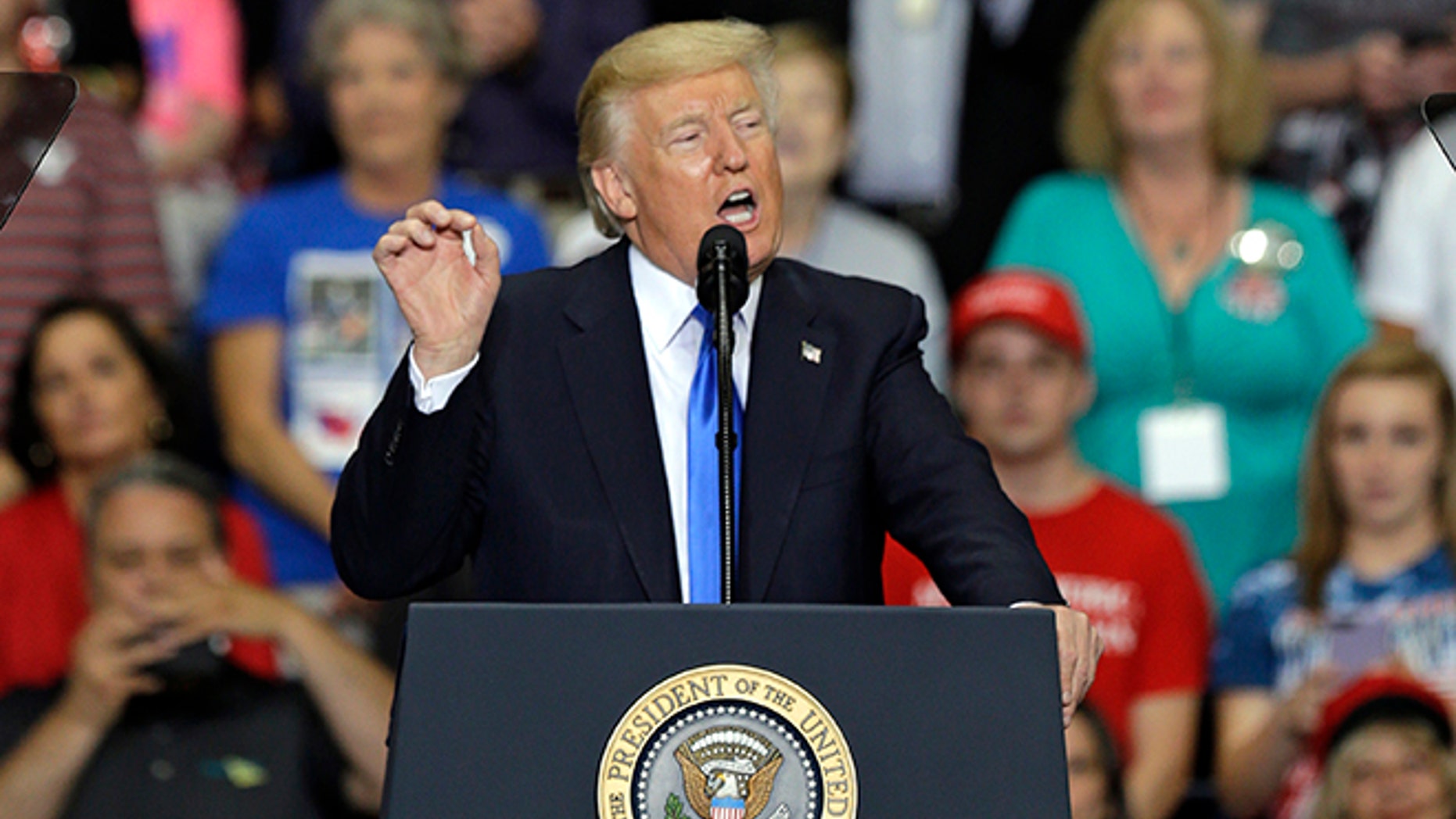 President Donald Trump speaks during a rally at the Covelli Centre, Tuesday, July 25, 2017, in Youngstown, Ohio. (AP Photo/Tony Dejak)