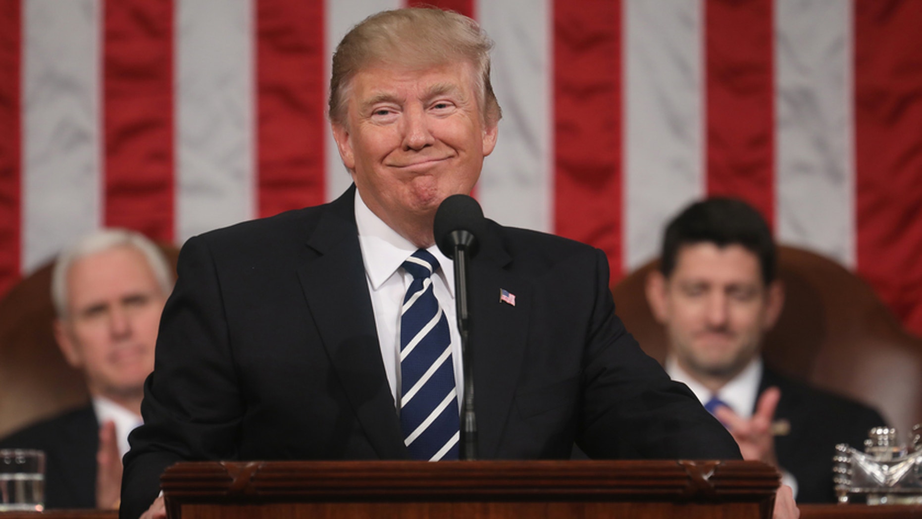 FILE -- President Donald Trump delivers his first address to a joint session of Congress from the floor of the House of Representatives iin Washington, February 28, 2017.