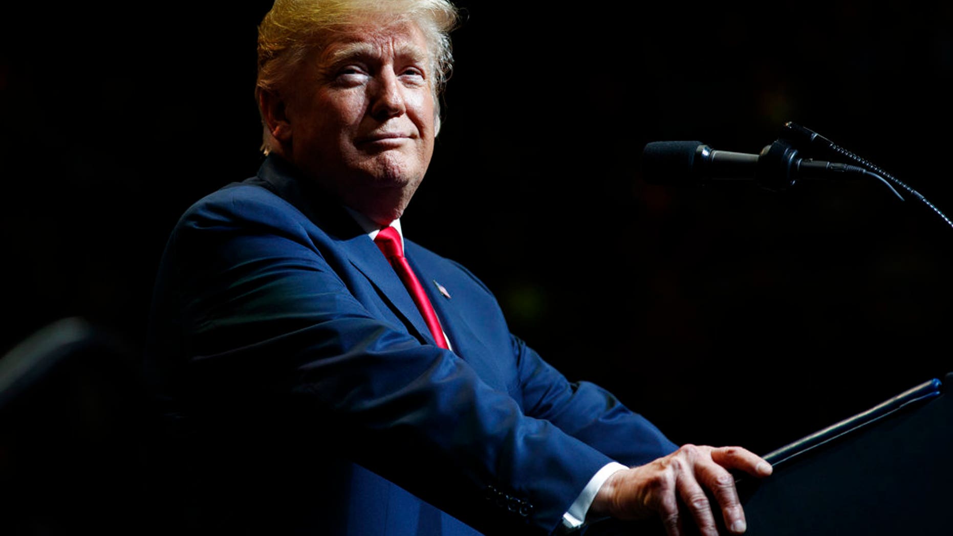 President Donald Trump pauses as he speaks at the North Side Gymnasium in Elkhart, Ind., Thursday, May 10, 2018, during a campaign rally. (AP Photo/Carolyn Kaster)