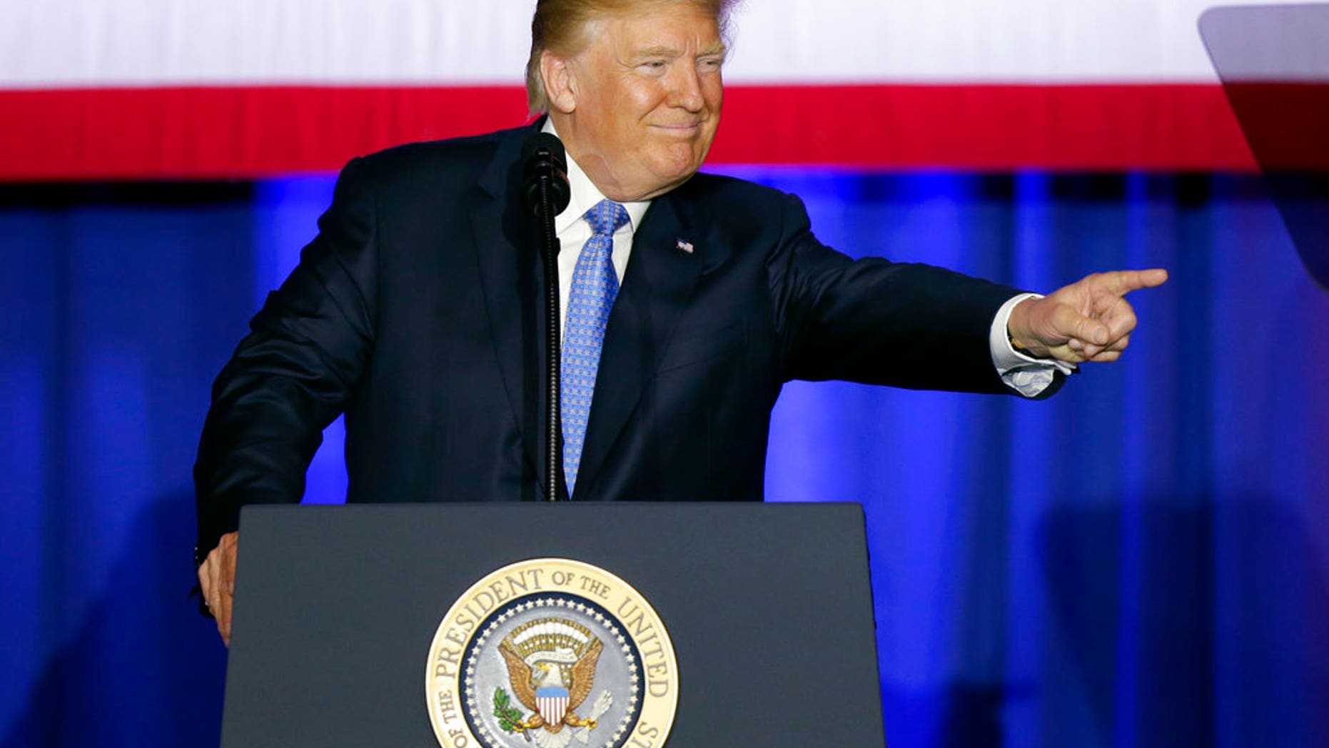 President Donald Trump speaks in Indianapolis, Wednesday, Sept. 27, 2017. Trump is calling the current tax system a "relic" and a "colossal barrier" that's standing in the way of the nation's economic comeback. He says that his tax proposal will help middle-class families save money and will eliminate loopholes that benefit the wealthy. (AP Photo/Michael Conroy)