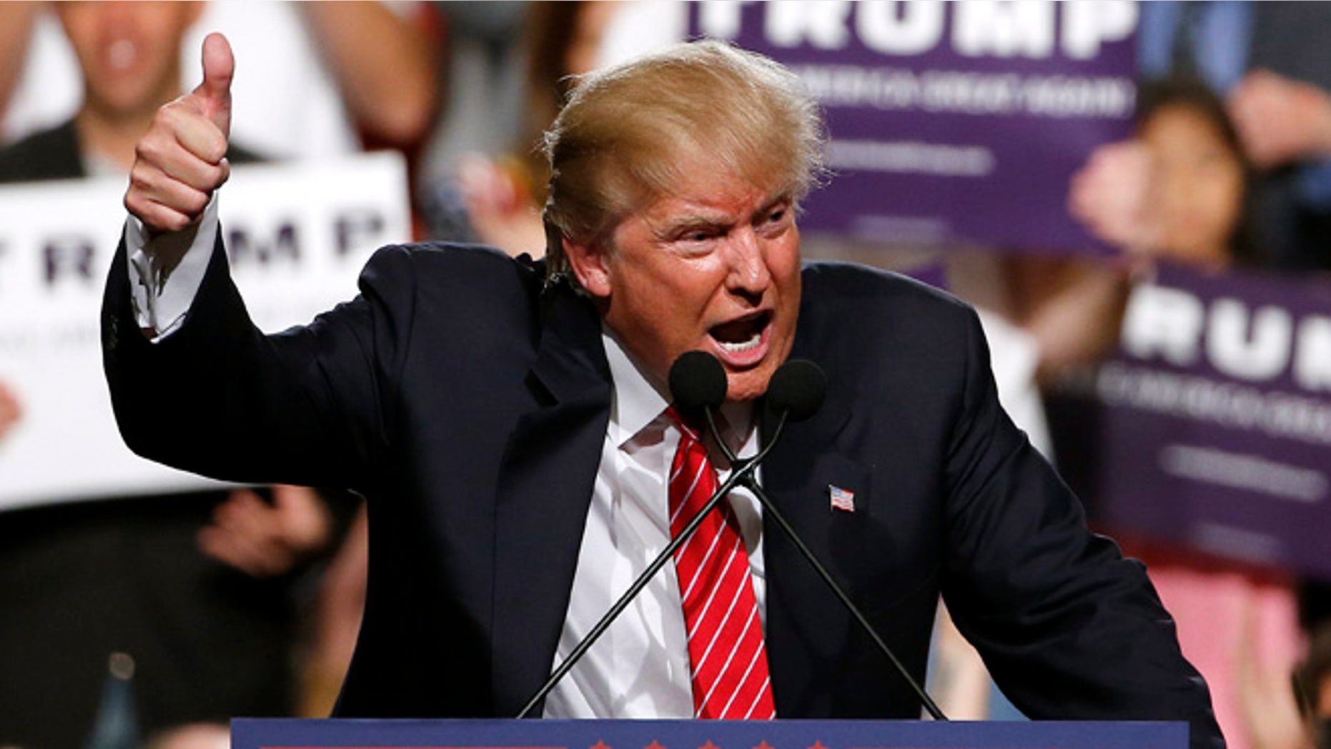 Republican presidential candidate Donald Trump finishes up speaking before a crowd of 3,500 Saturday, July 11, 2015, in Phoenix. (AP Photo/Ross D. Franklin)