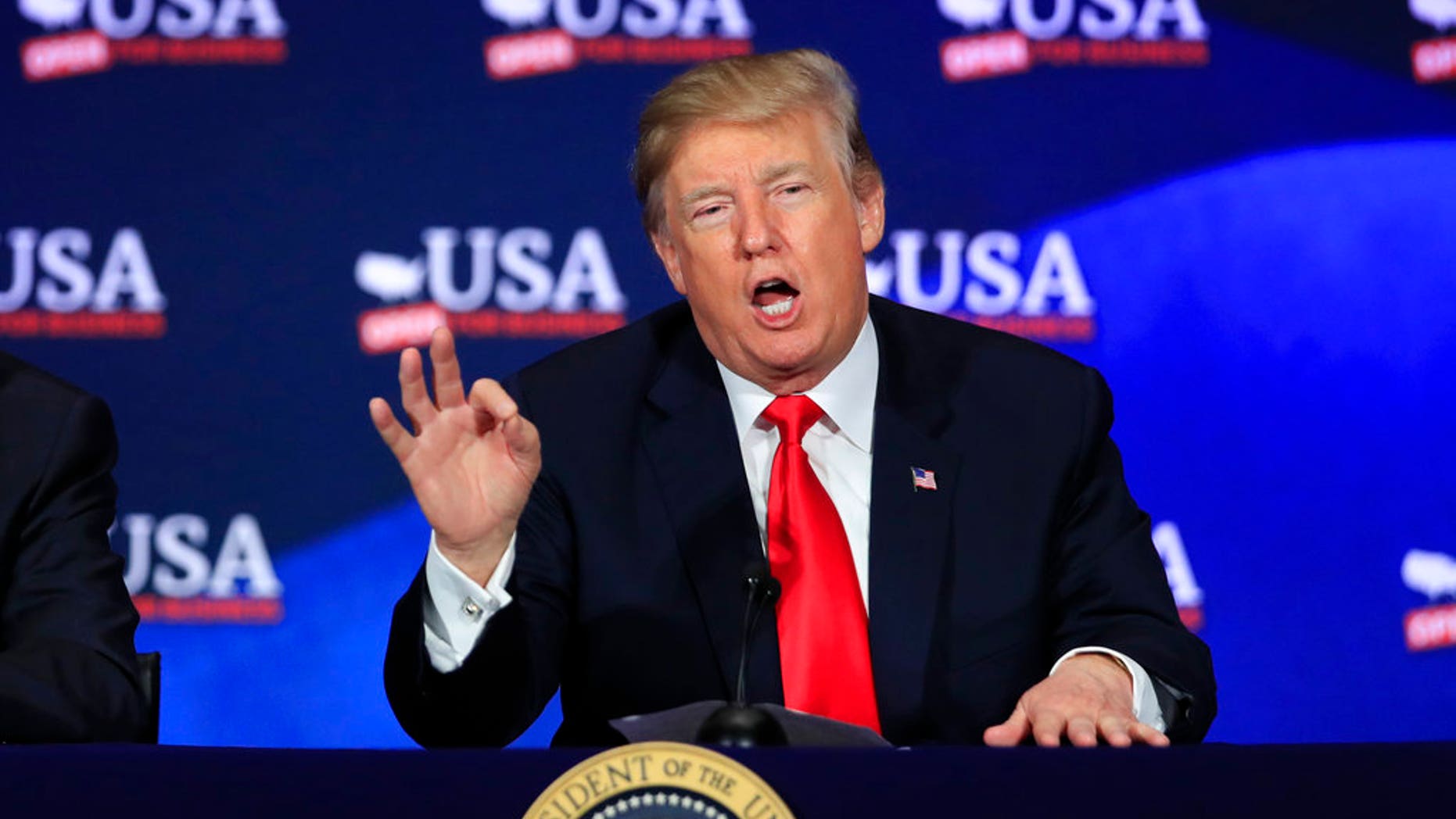 In this May 5, 2018 photo, President Donald Trump speaks during a roundtable discussion on tax reform at Cleveland Public Auditorium and Conference Center in Cleveland, Ohio. Trump says he will announce his decision on whether to keep the U.S. in the Iran nuclear deal on Tuesday. (AP Photo/Manuel Balce Ceneta)