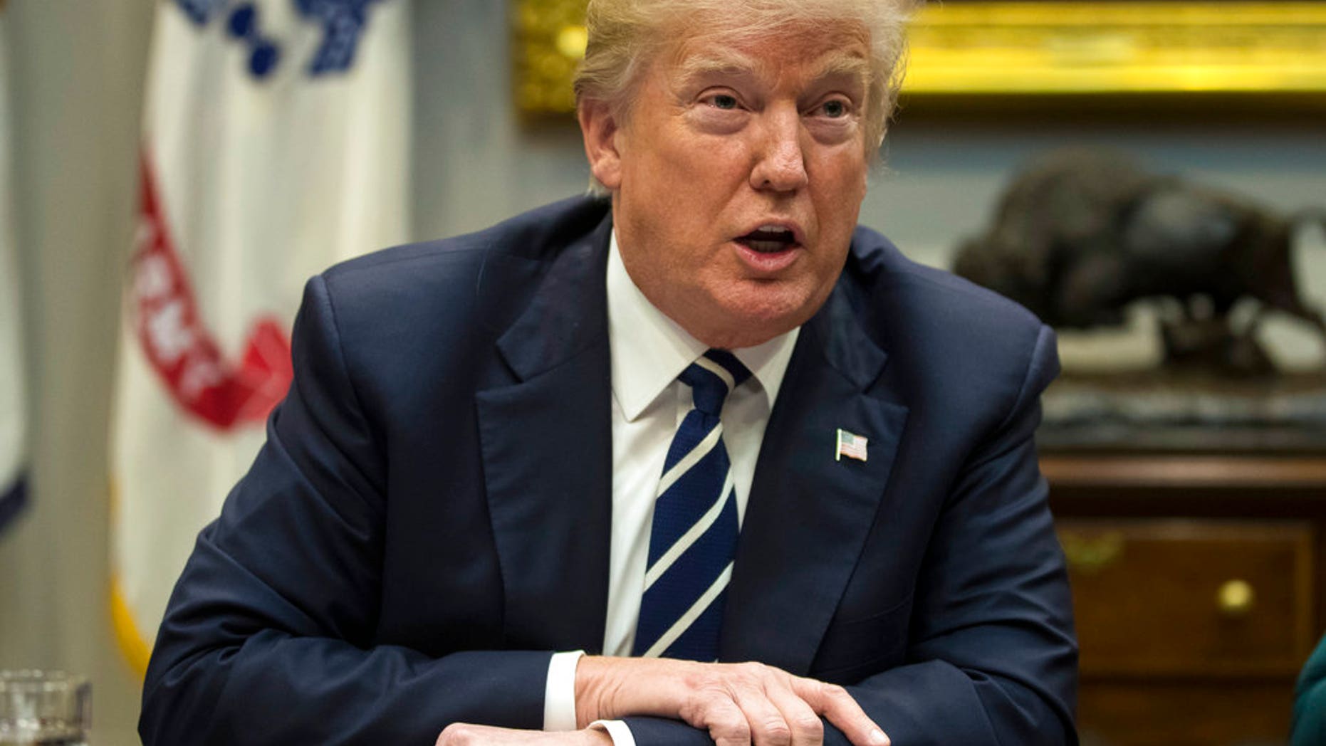 President Donald Trump speaks during a prison reform roundtable in the Roosevelt Room of the Washington, Thursday, Jan. 11, 2018. (AP Photo/Carolyn Kaster)