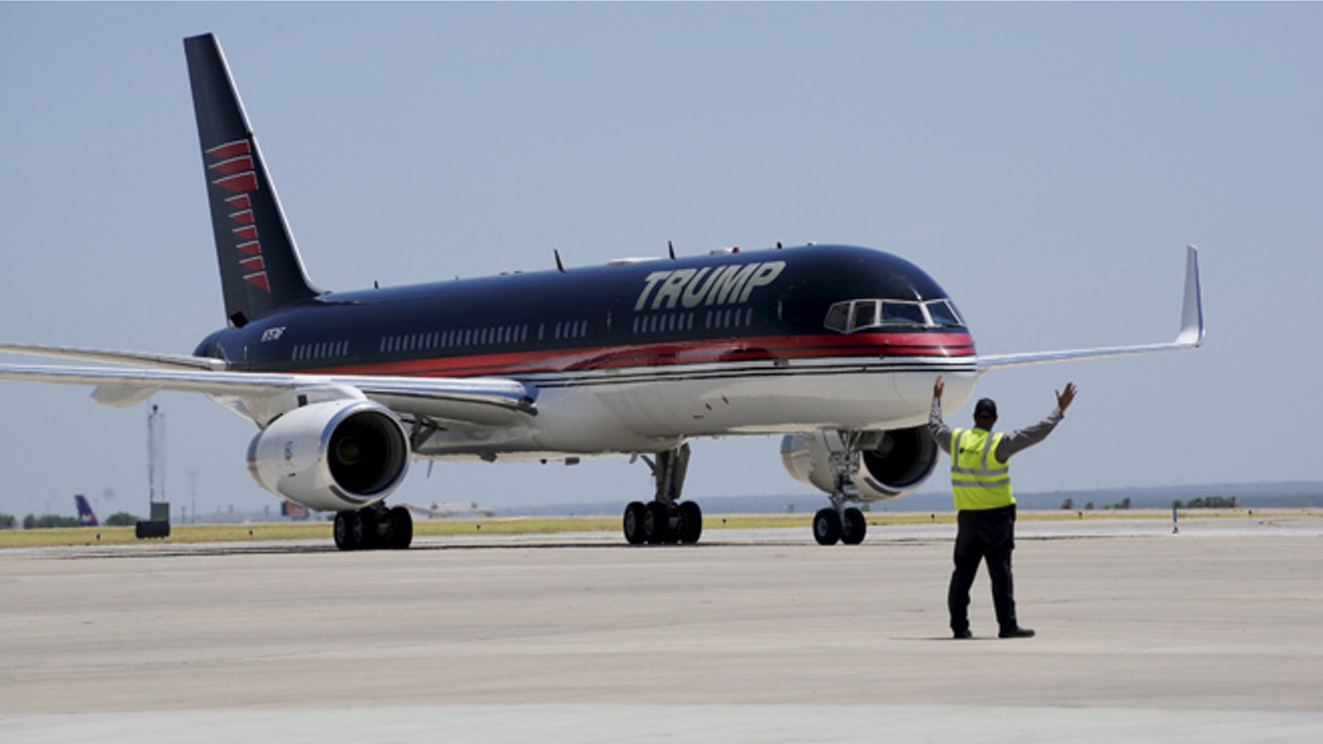 July 23, 2015: Republican presidential candidate Donald Trump arrives on his signature plane in Laredo, Texas.