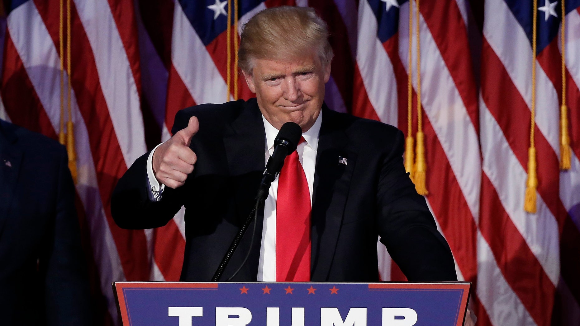 File photo - U.S. President-elect Donald Trump greets supporters during his election night rally in Manhattan, New York, U.S., November 9, 2016. (REUTERS/Mike Segar)