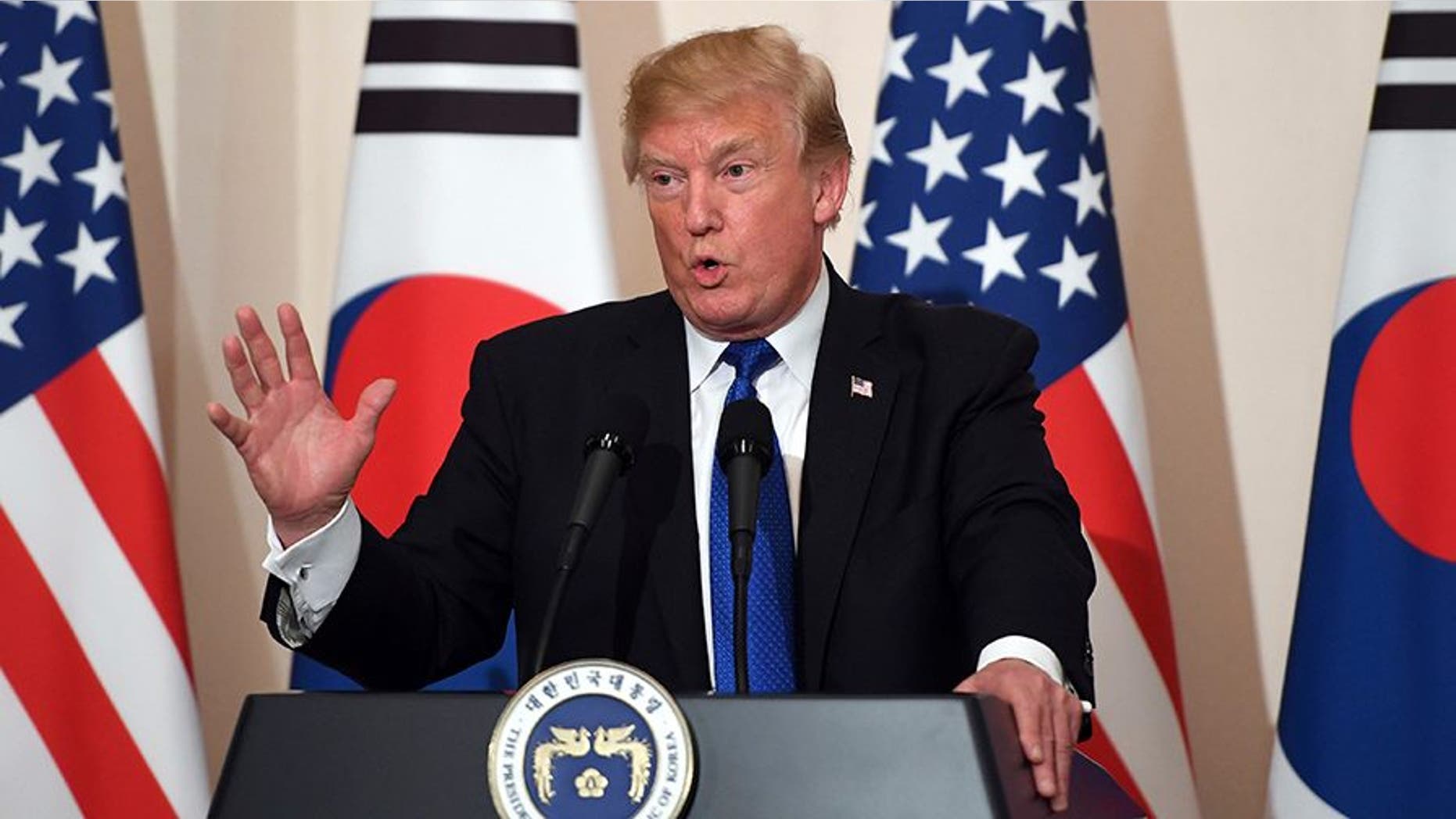 U.S. President Donald Trump speaks during a joint press conference with South Korean President Moon Jae-In at the presidential Blue House in Seoul, South Korea, Tuesday, Nov. 7, 2017. (Jung Yeon-Je/Pool Photo via AP)