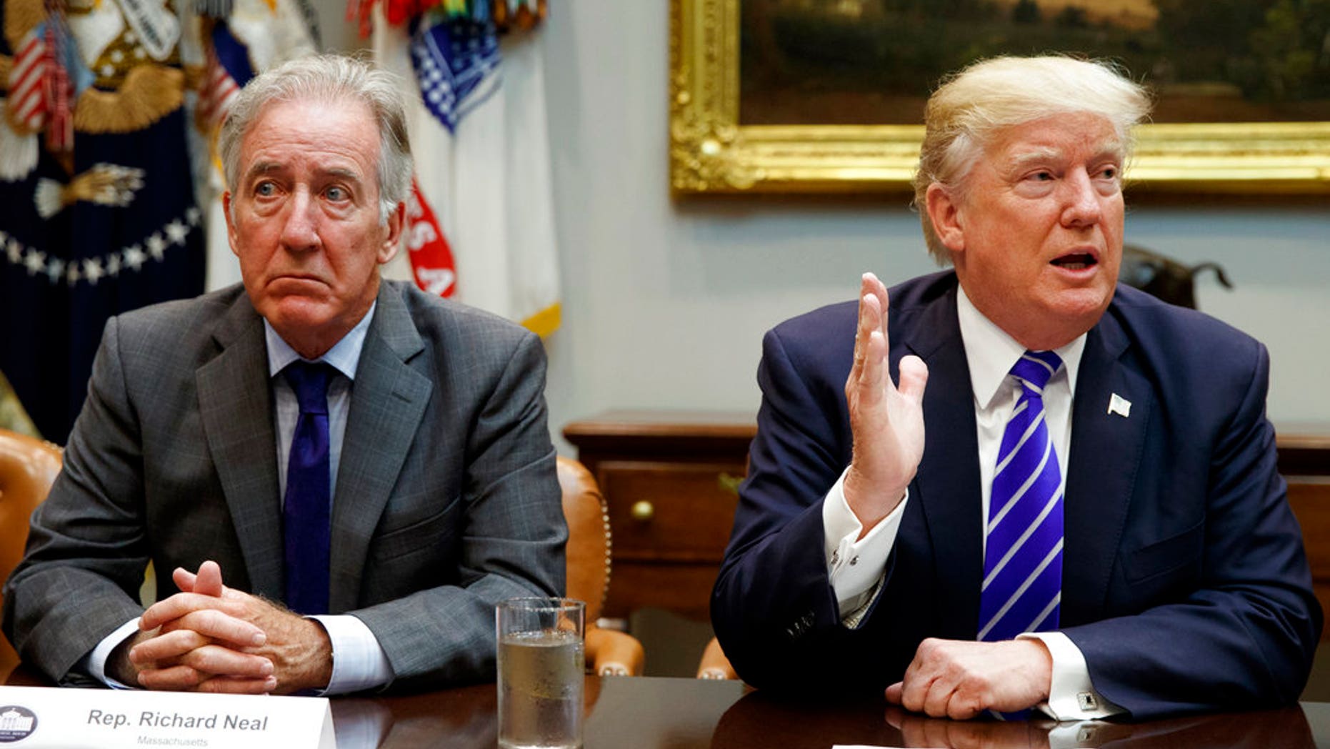 Rep. Richard Neal, D-Mass., listens as President Donald Trump speaks during a meeting with members of the House Ways and Means committee in the Roosevelt Room of the White House, Tuesday, Sept. 26, 2017, in Washington. (AP Photo/Evan Vucci)