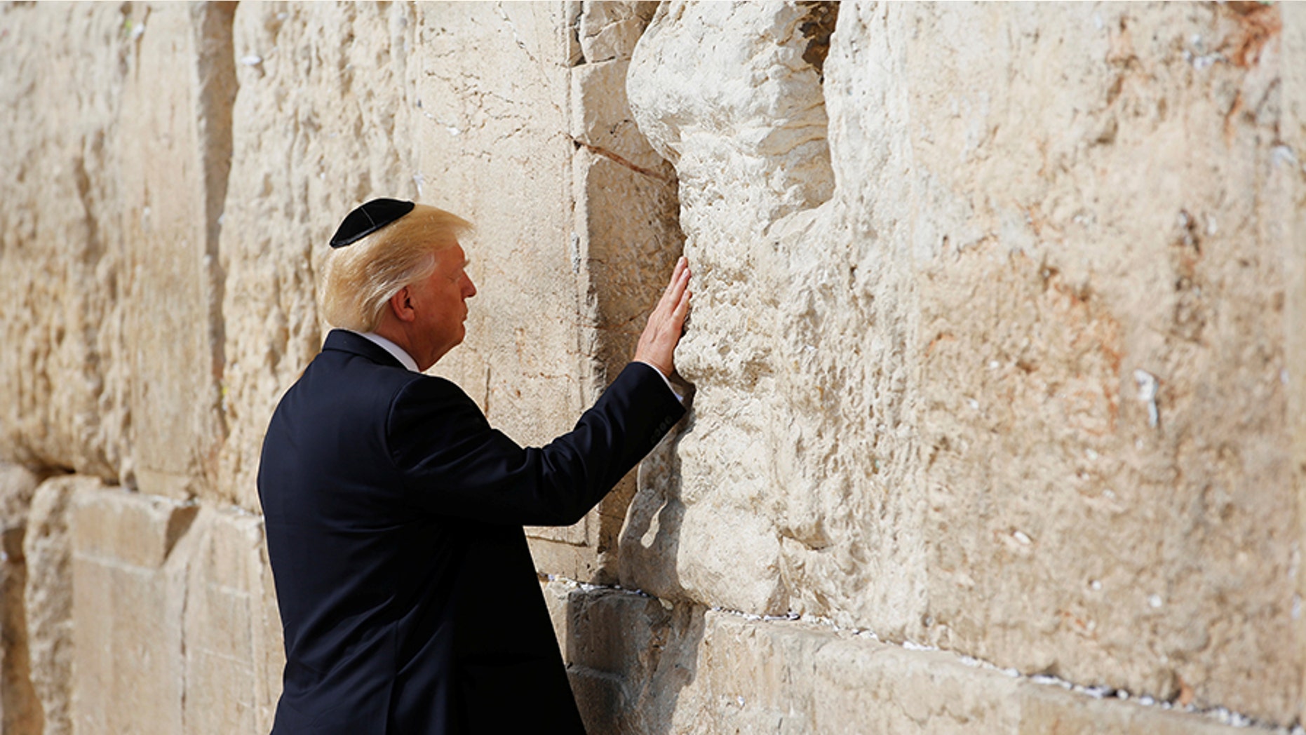 Israel’s transportation minister is pushing ahead with a plan to extend Jerusalem’s soon-to-open high speed rail line to the Western Wall, where he wants to name a future station after President Trump.