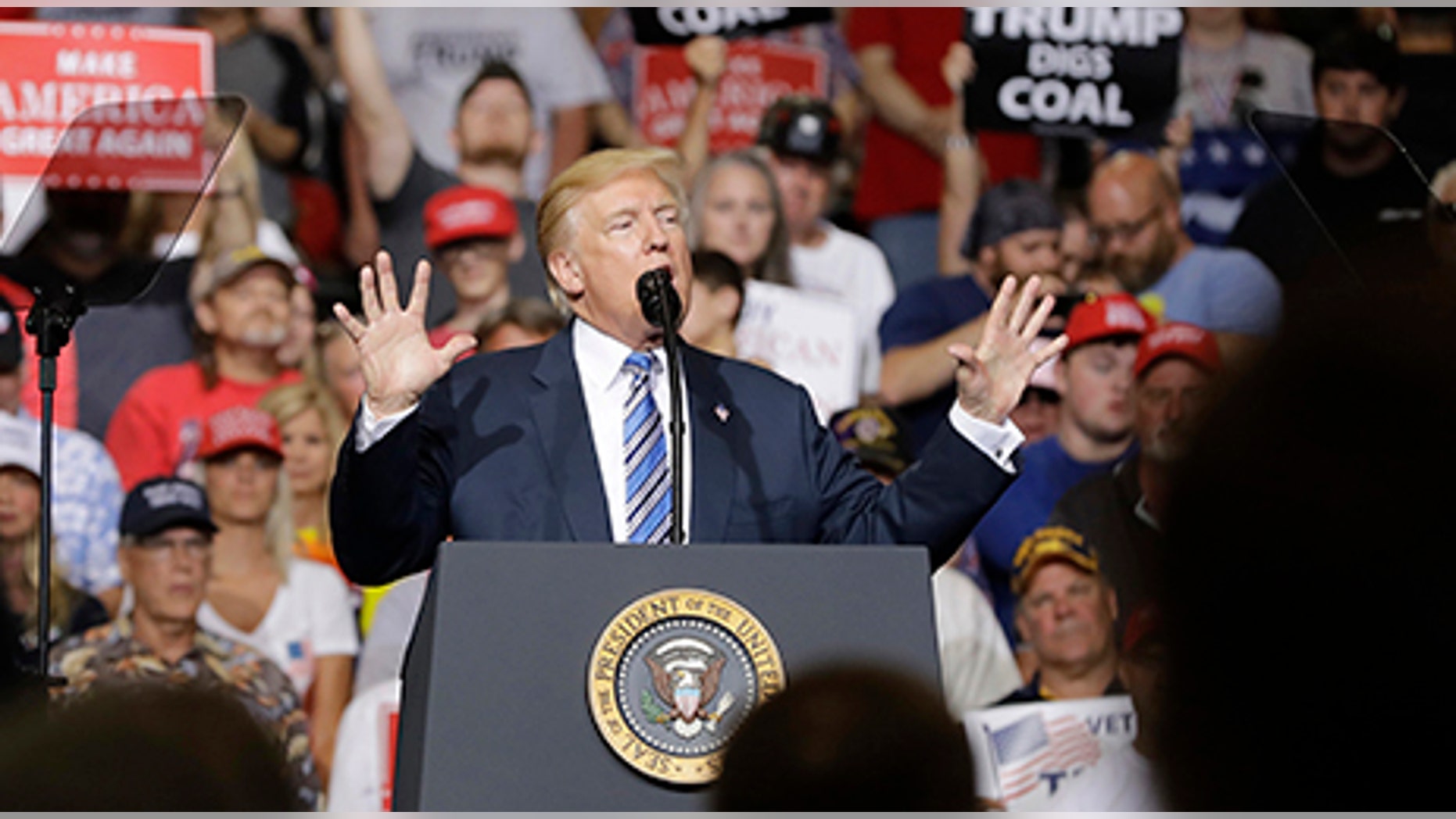 President Donald Trump speaks during a rally Thursday, Aug. 3, 2017, in Huntington, W.Va. (AP Photo/Darron Cummings)