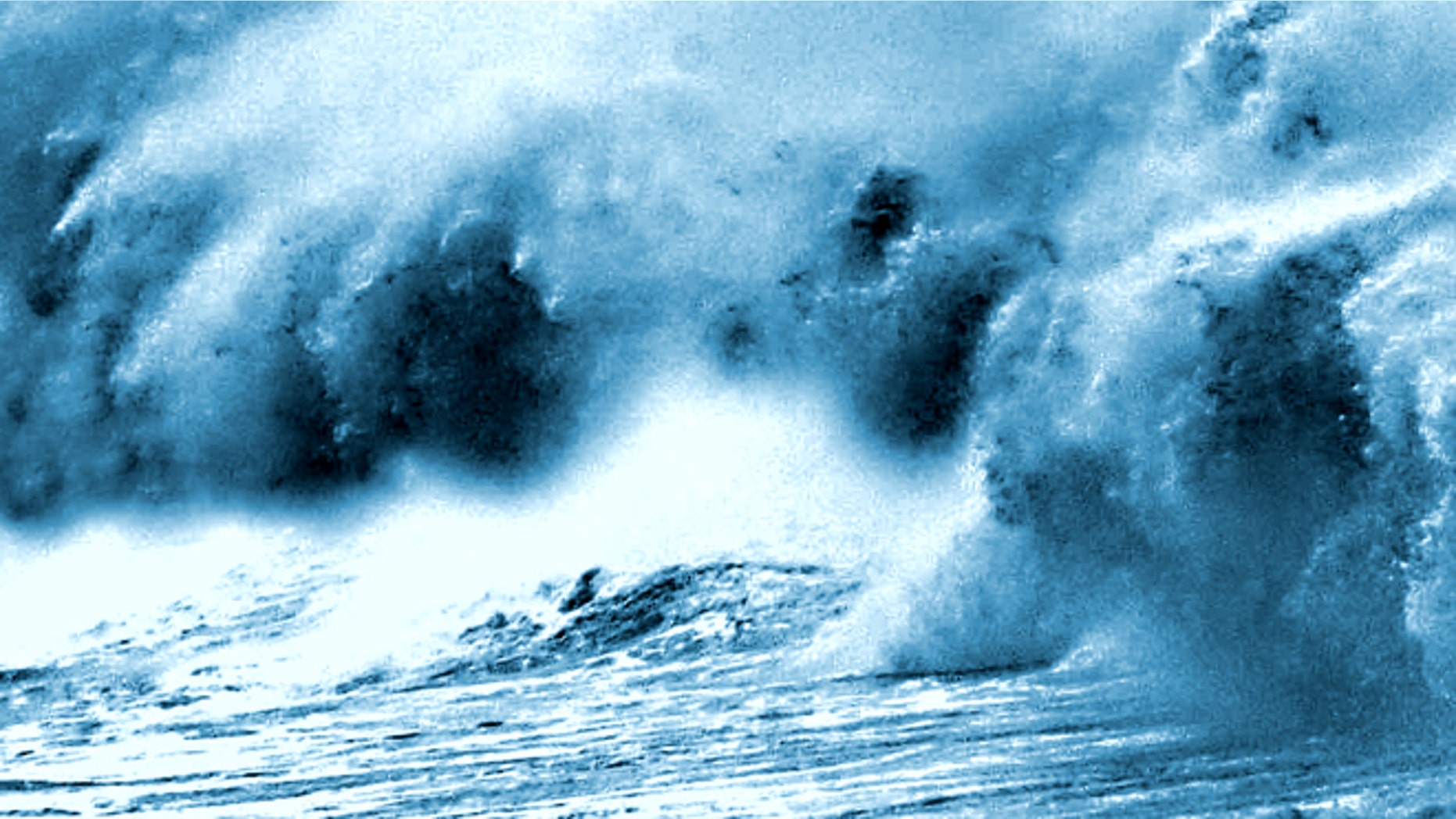 May 25, 2001: A giant wave lashes a popular promenade in Bombay, India.