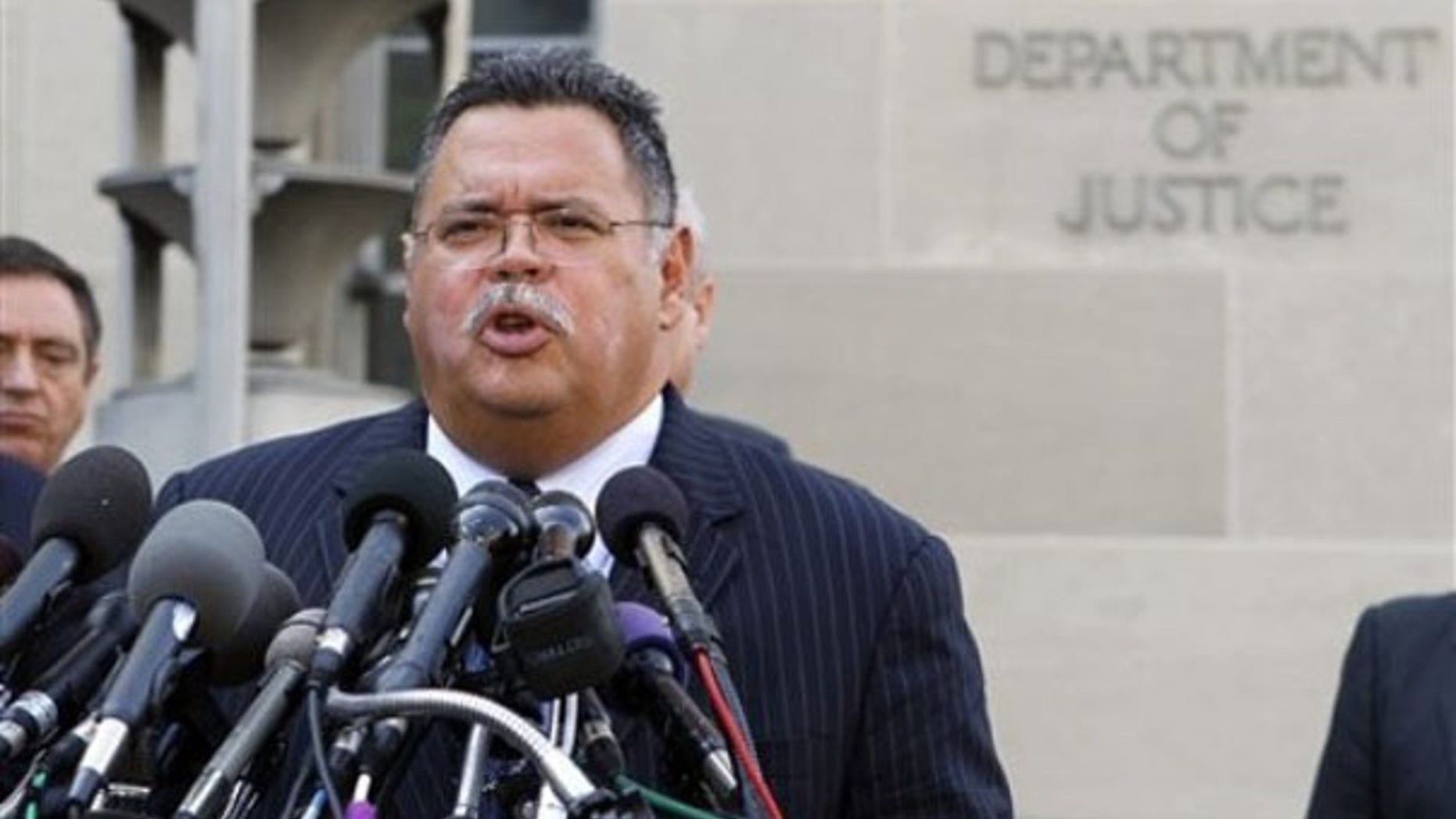 Tucson Police Chief Roberto Villasenor talks to reporters May 26 following a meeting between police chiefs and Attorney General Eric Holder in Washington. (AP Photo)