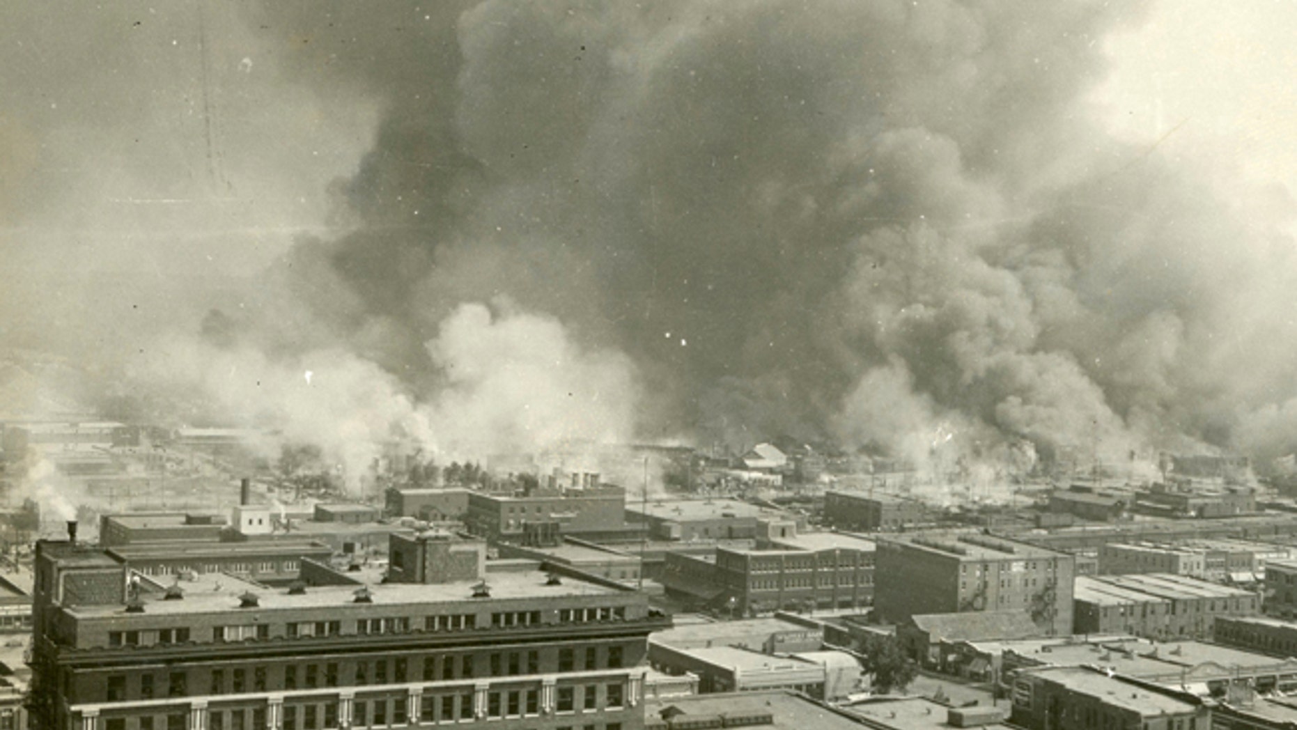 The Greenwood neighborhood of Tulsa, Okla., is burned down during a race riot in 1921.