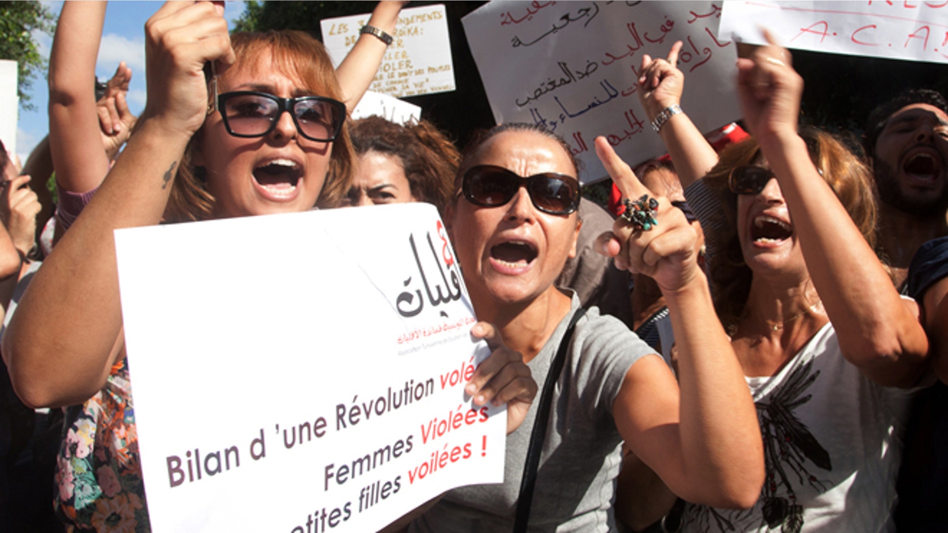 Oct. 2, 2012: Hundreds of Tunisian women protest in support of a woman who says she was raped by police and is facing accusations of violating modesty laws in Tunis.