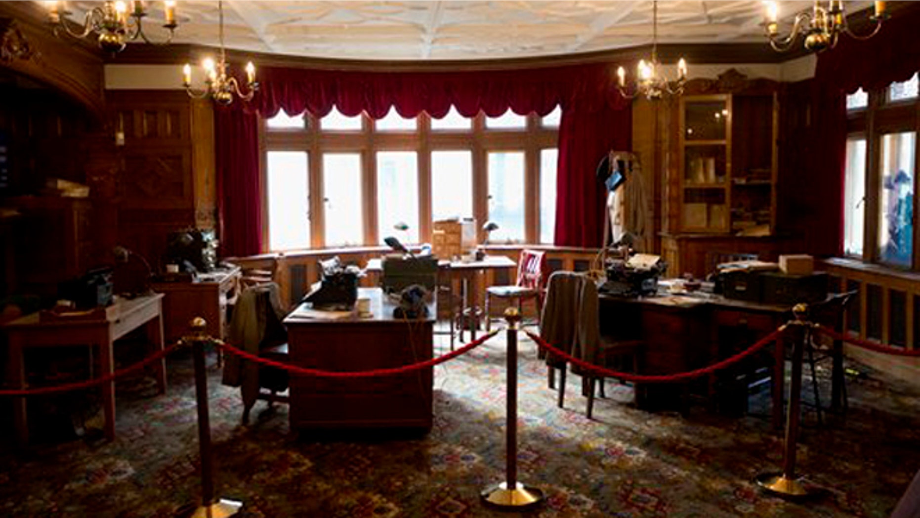 In photo dated Thursday, Jan. 15, 2015, a library exhibit at Bletchley Park, as it would have been used by infamous codebreaker Alan Turing during World War II, in Bletchley, England. (AP Photo/Matt Dunham)