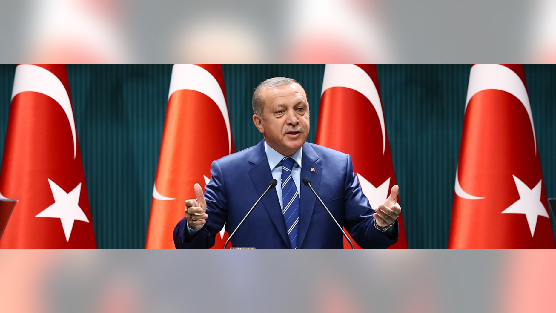 Turkish President Recep Tayyip Erdogan delivers a speech at the Presidential Palace in Ankara, Thursday, Aug. 18, 2016.