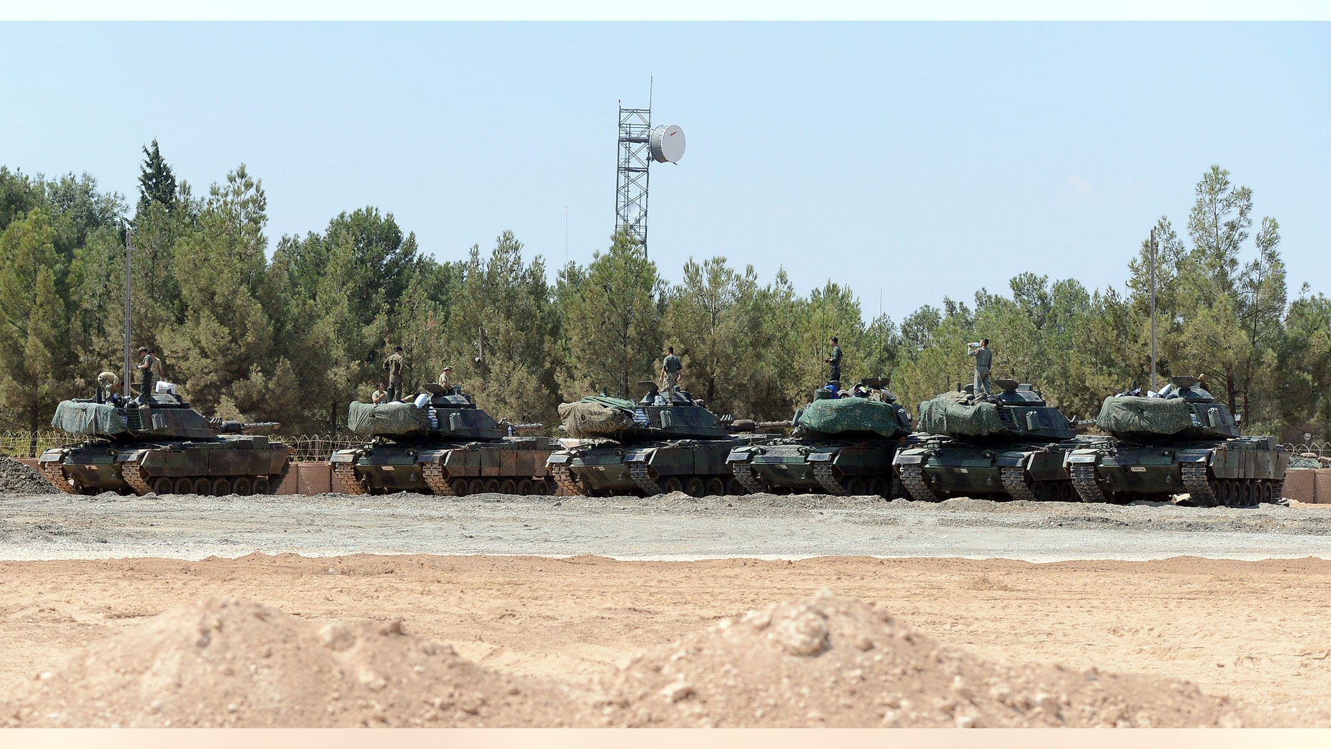 Turkish tanks stationed near the Syrian border.