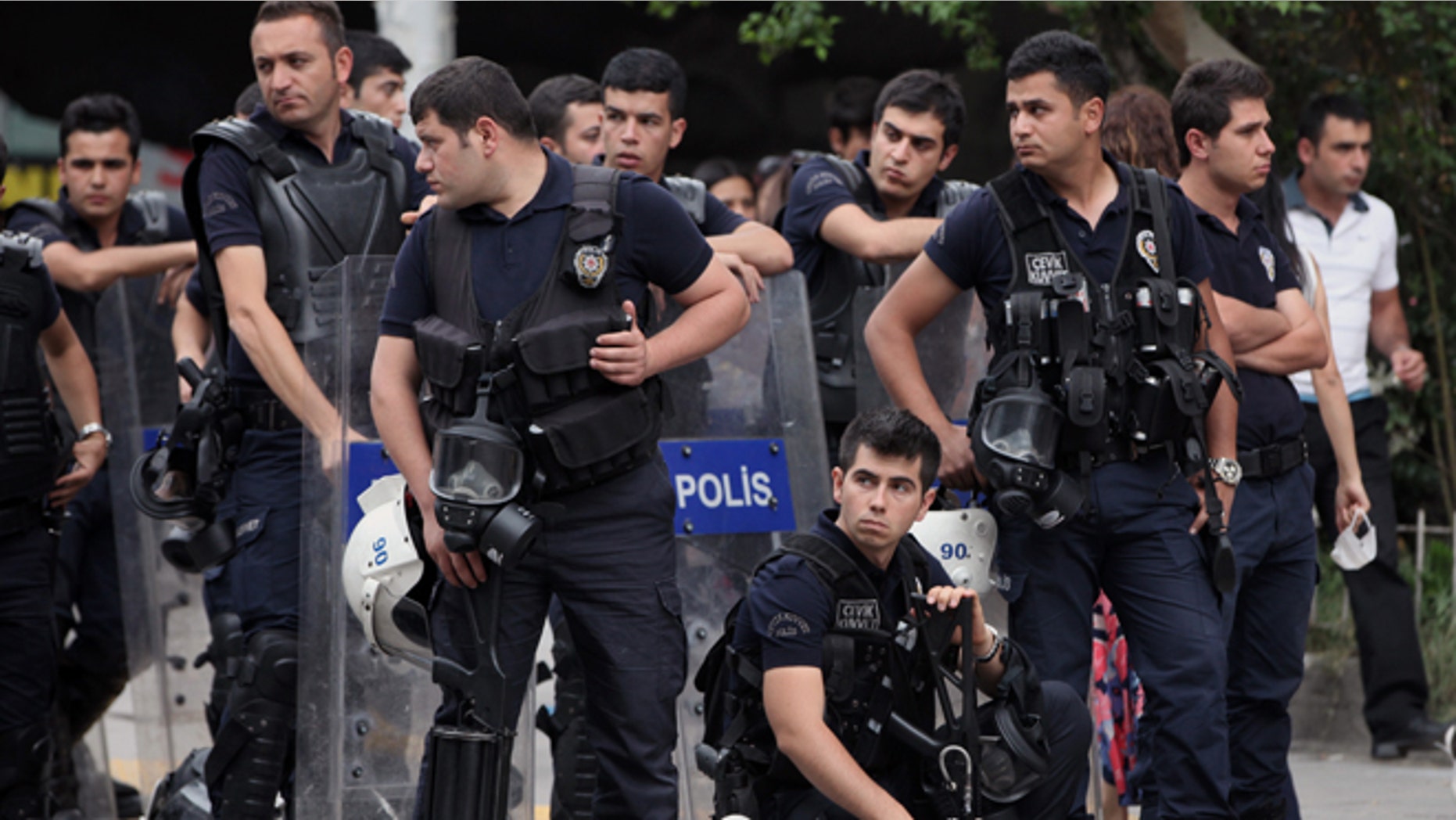 June 17, 2013: Riot police stand by near a rally by the labor unions in Ankara, Turkey. A day earlier, riot police cordoned off streets, set up roadblocks and fired tear gas and water cannons to prevent anti-government protesters from an effort to return to Taksim Square in Istanbul. Labor unions and political foes of Prime Minister Recep Erdogan rallied Monday by the thousands across Turkey, hoping to capitalize on weeks of protest that began as small-scale activism and parlay it into a chance to register broader discontent.