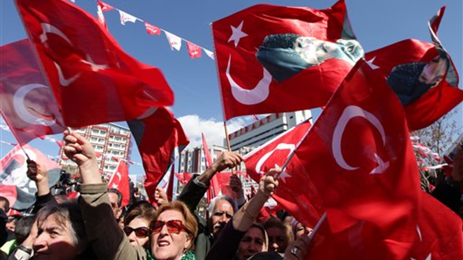 March 27, 2012: Supporters cheer Kemal Kilicdaroglu, leader of the main opposition Republican People's Party, unseen, during a rally in Ankara, Turkey.