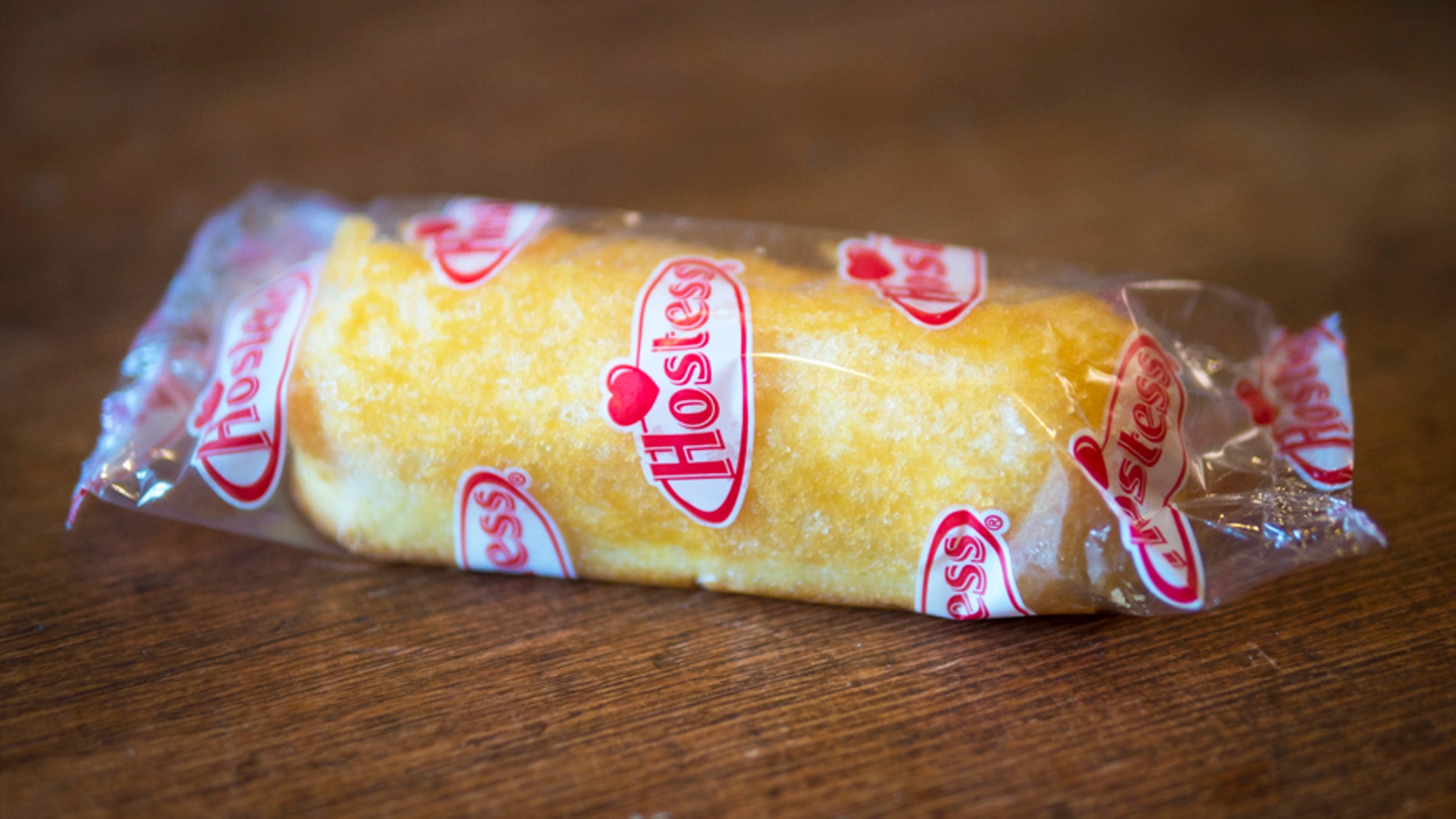 London, England - January 25, 2014: Hostess Twinkie Cake is an American Snack Cake created by James Alexander Dewar in 1930. They are distributed by Hostess.