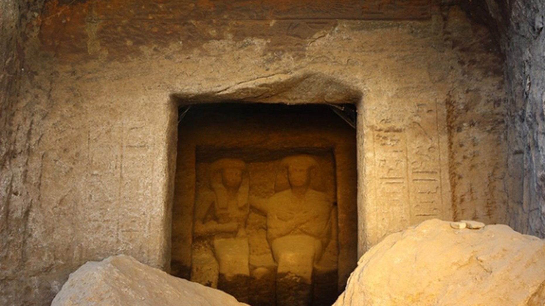 A statue of an ancient Egyptian power couple (a man named Neferkhewe and his wife) from the 18th Dynasty graces a cenotaph at the ancient Egyptian site Gebel el Silsila.