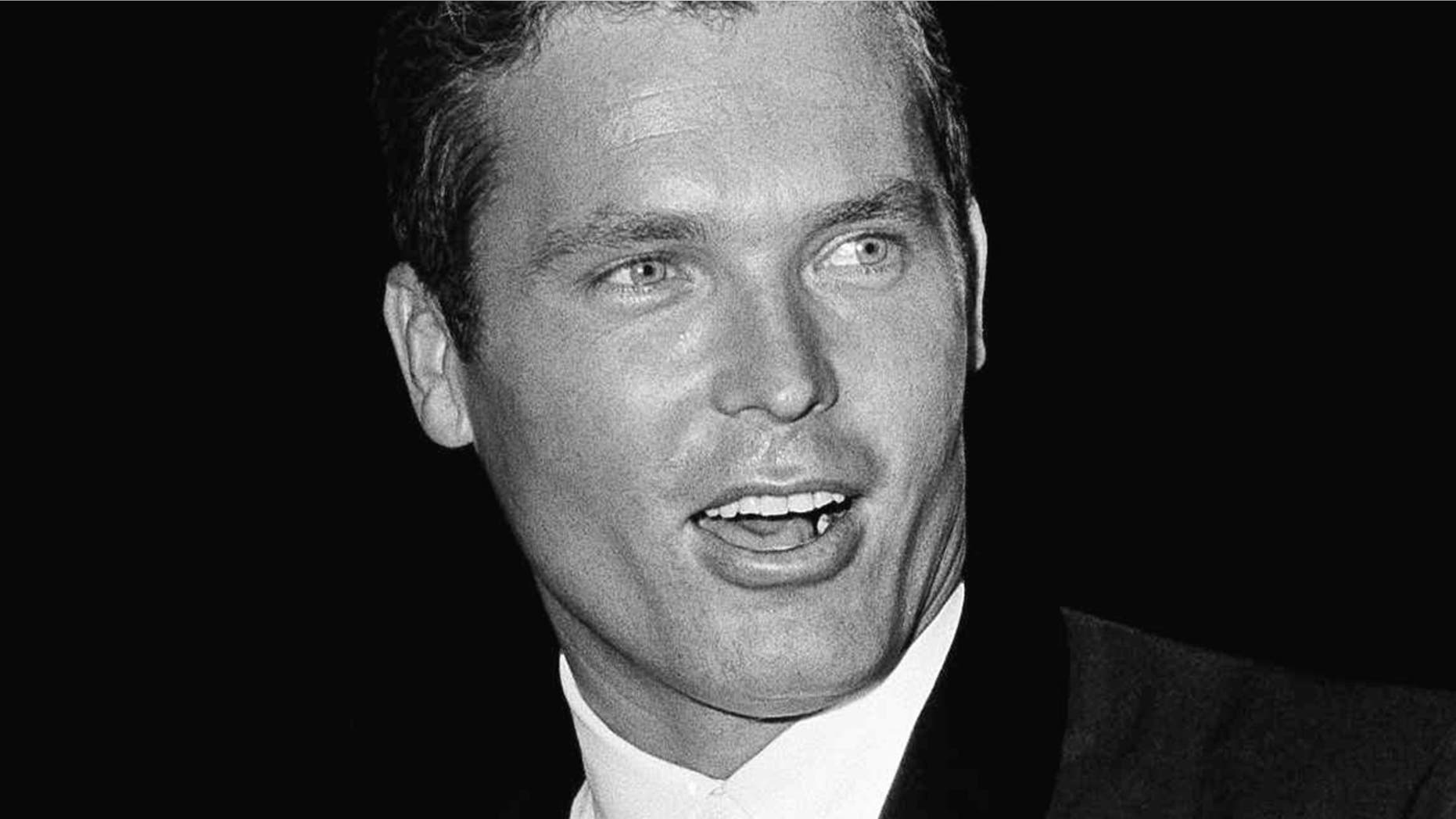 In this April 9, 1962 file photo, actor Ty Hardin arrives for the Academy Award presentations in Santa Monica, Calif. Hardin, a popular film and television actor who starred in the TV Western series âBroncoâ and replaced Clint Walker in 1958 as the star of the TV show âCheyenne, â died Thursday at age 87.