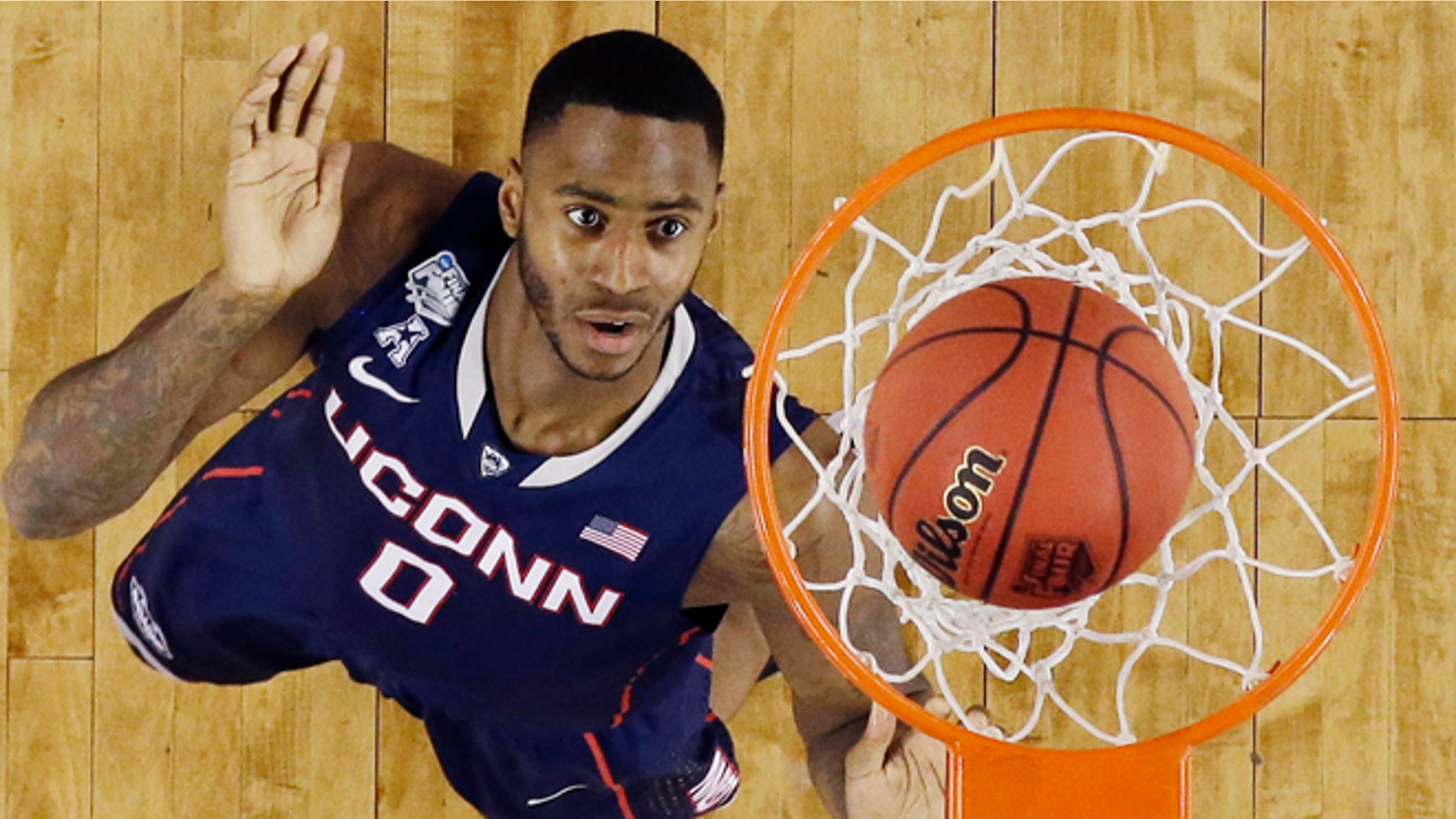 Apr. 5, 2014: Connecticut forward Phillip Nolan shoots against Florida during the second half of the NCAA Final Four tournament college basketball semifinal game in Arlington, Texas.