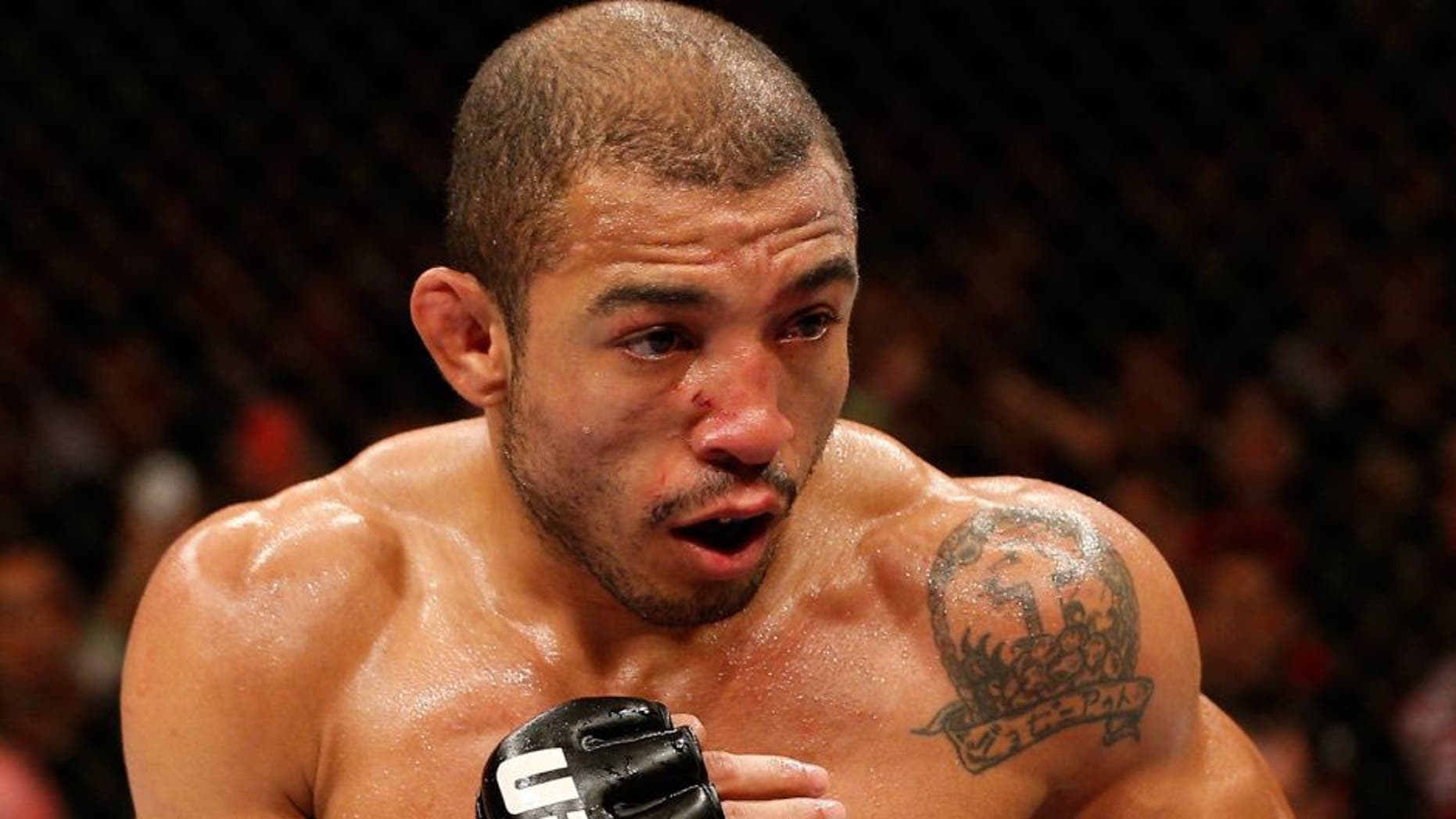 RIO DE JANEIRO, BRAZIL - OCTOBER 25: Jose Aldo of Brazil stands in the Octagon during his featherweight championship bout against Chad Mendes during the UFC 179 event at Maracanazinho on October 25, 2014 in Rio de Janeiro, Brazil. (Photo by Josh Hedges/Zuffa LLC/Zuffa LLC via Getty Images)